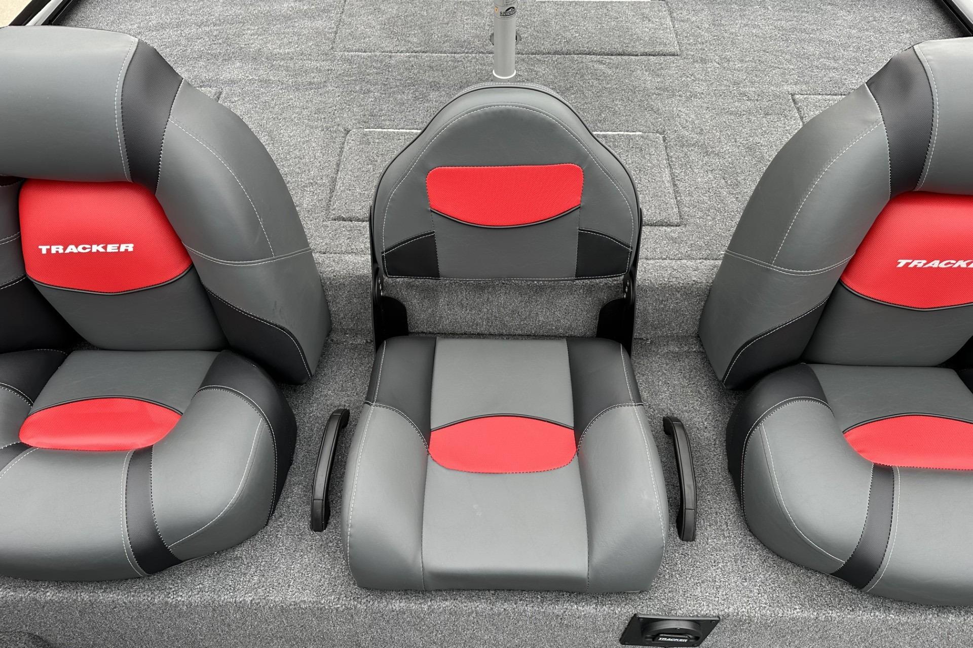 2025 Tracker Savage 215 boat seats, gray and red upholstery, sleek design.