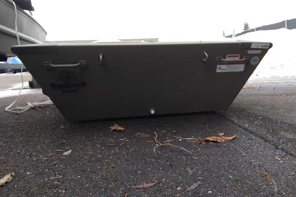 2026 Tracker Grizzly 10 Jon boat on pavement, showcasing sturdy design and build.