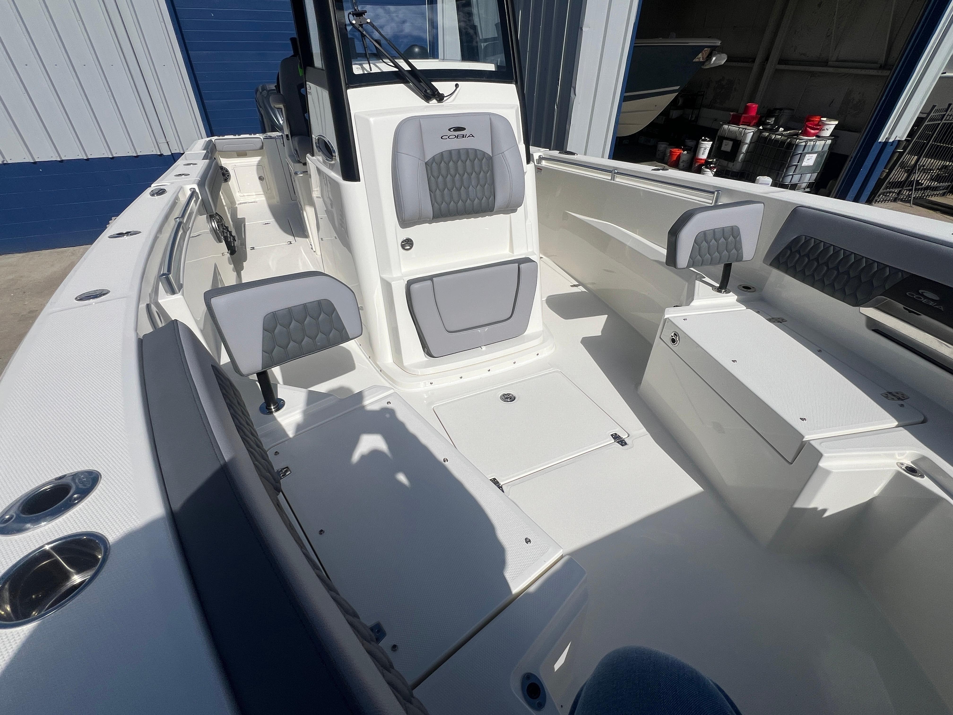 2025 Cobia 285 Open Center Console boat with spacious seating and modern design.