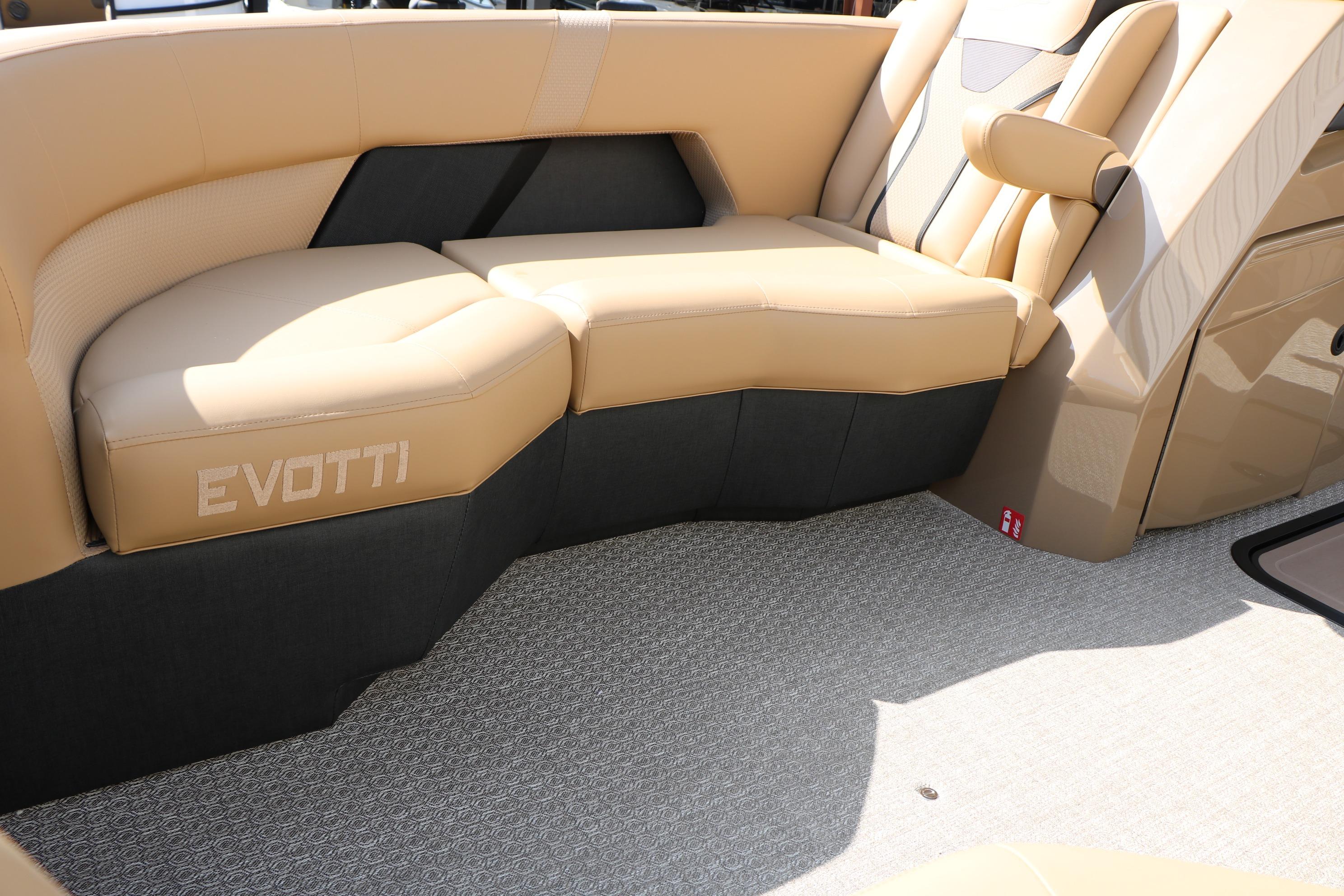 Luxurious seating in the 2026 Evotti 723CS boat, featuring tan and black upholstery.