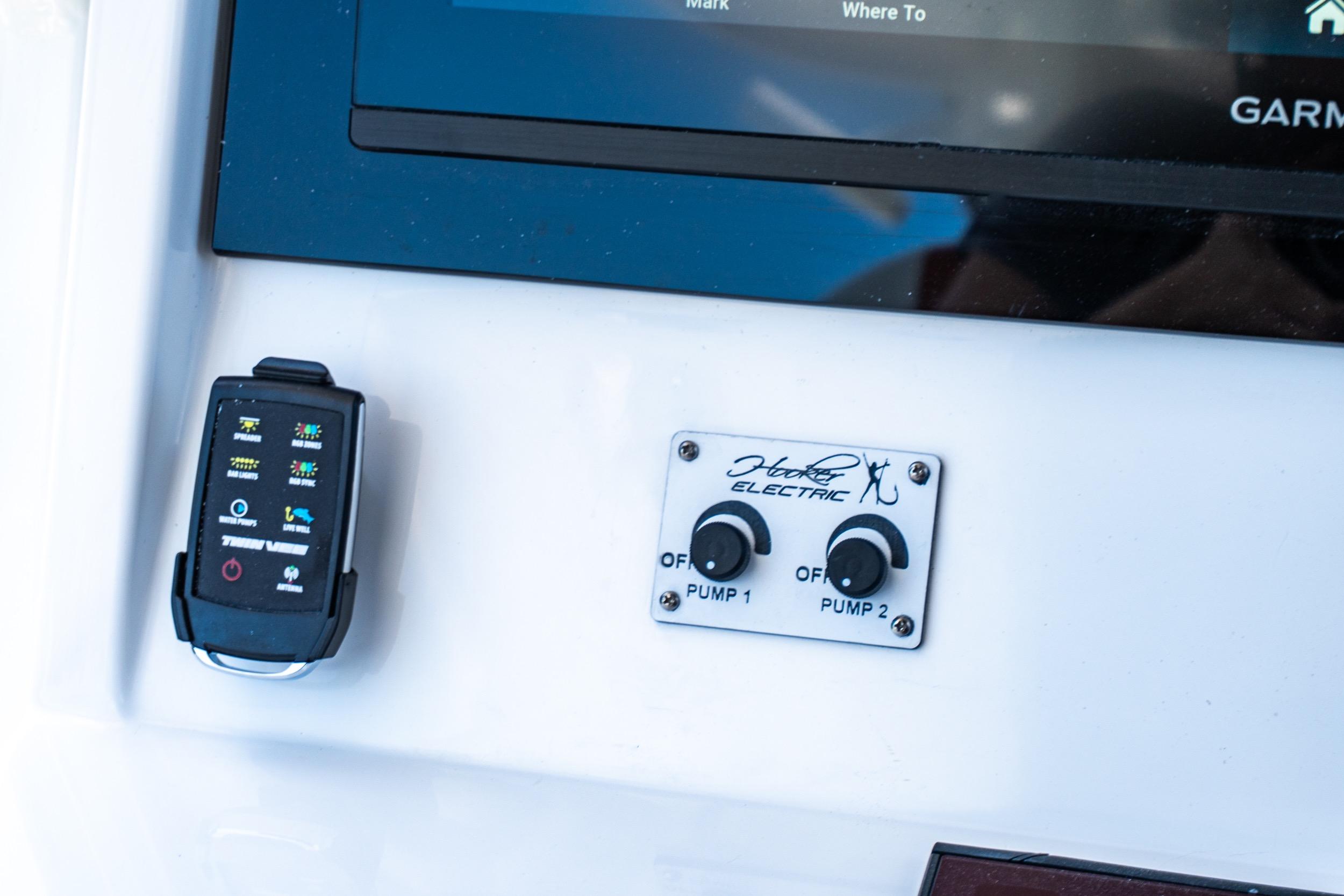 Control panel on 2026 Twin Vee 400 GFX2 CC boat with Hooker Electric switches.