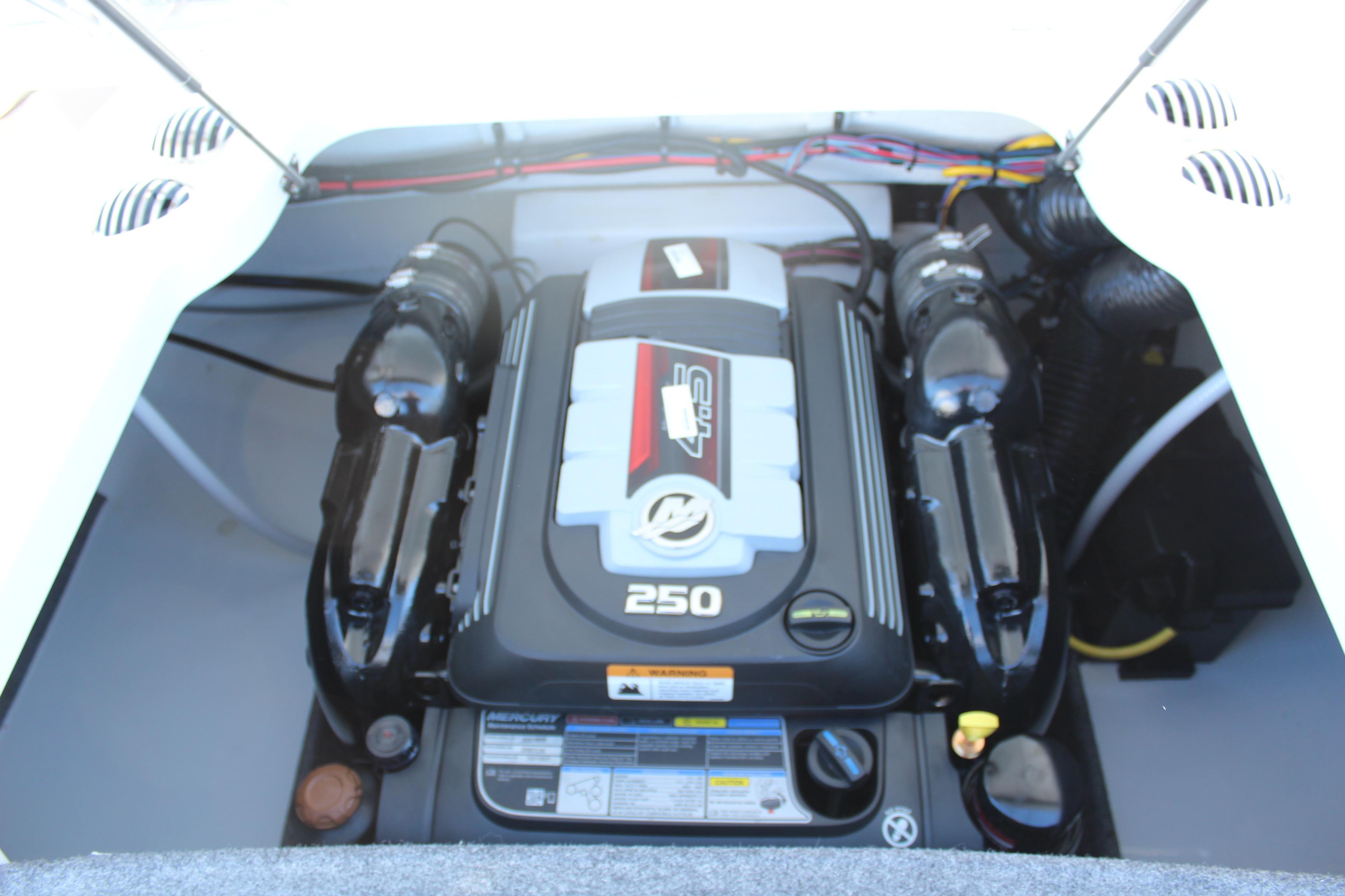 Engine compartment of 2026 Four Winns H2 Freedom boat, featuring a powerful 250 HP engine.