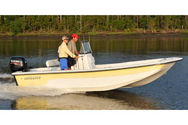 Manufacturer Provided Image: 2025 Sundance B20CCR boat cruising on a calm lake with two passengers.
