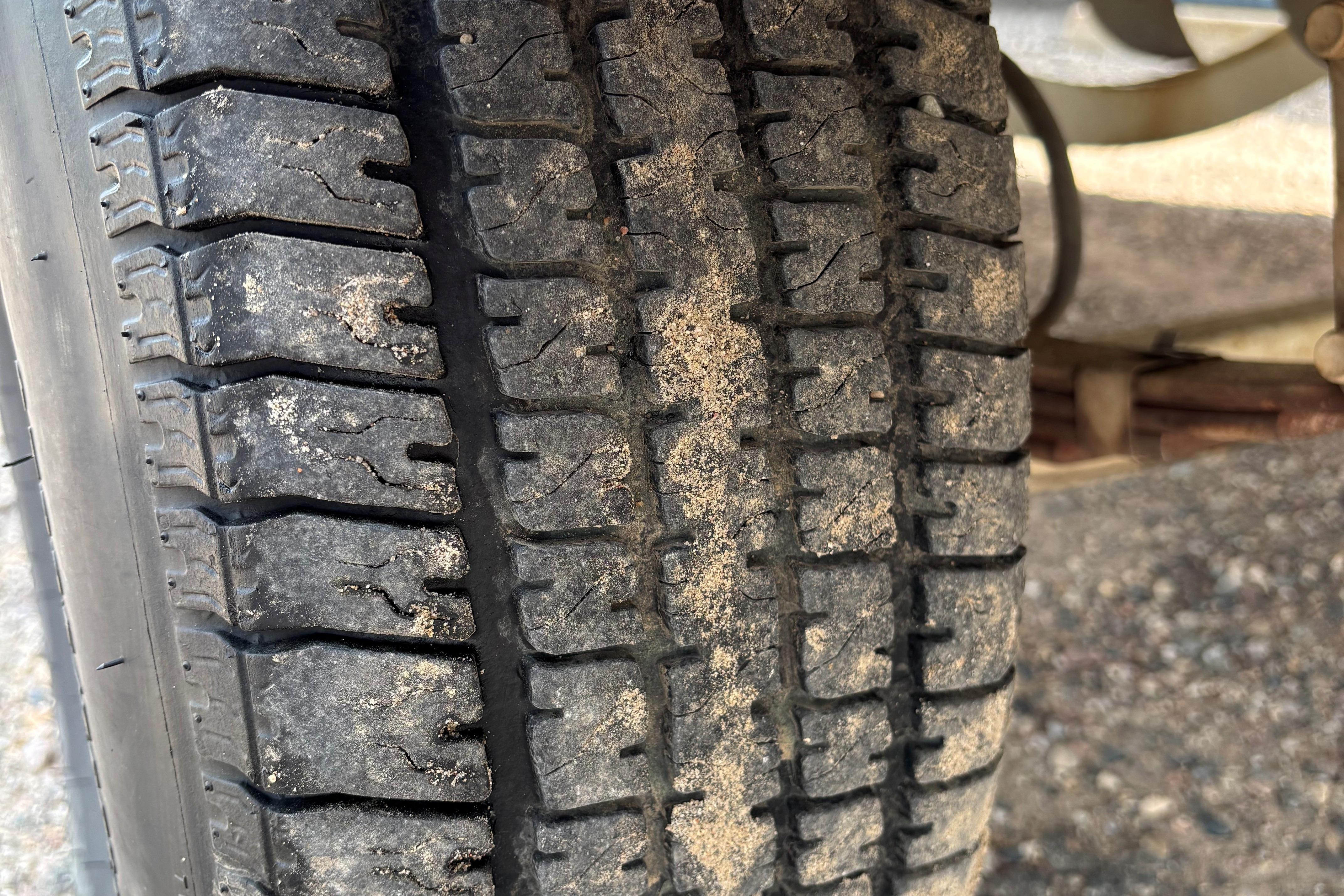 Close-up of a worn tire on a 1999 MasterCraft 205 PRO STAR.
