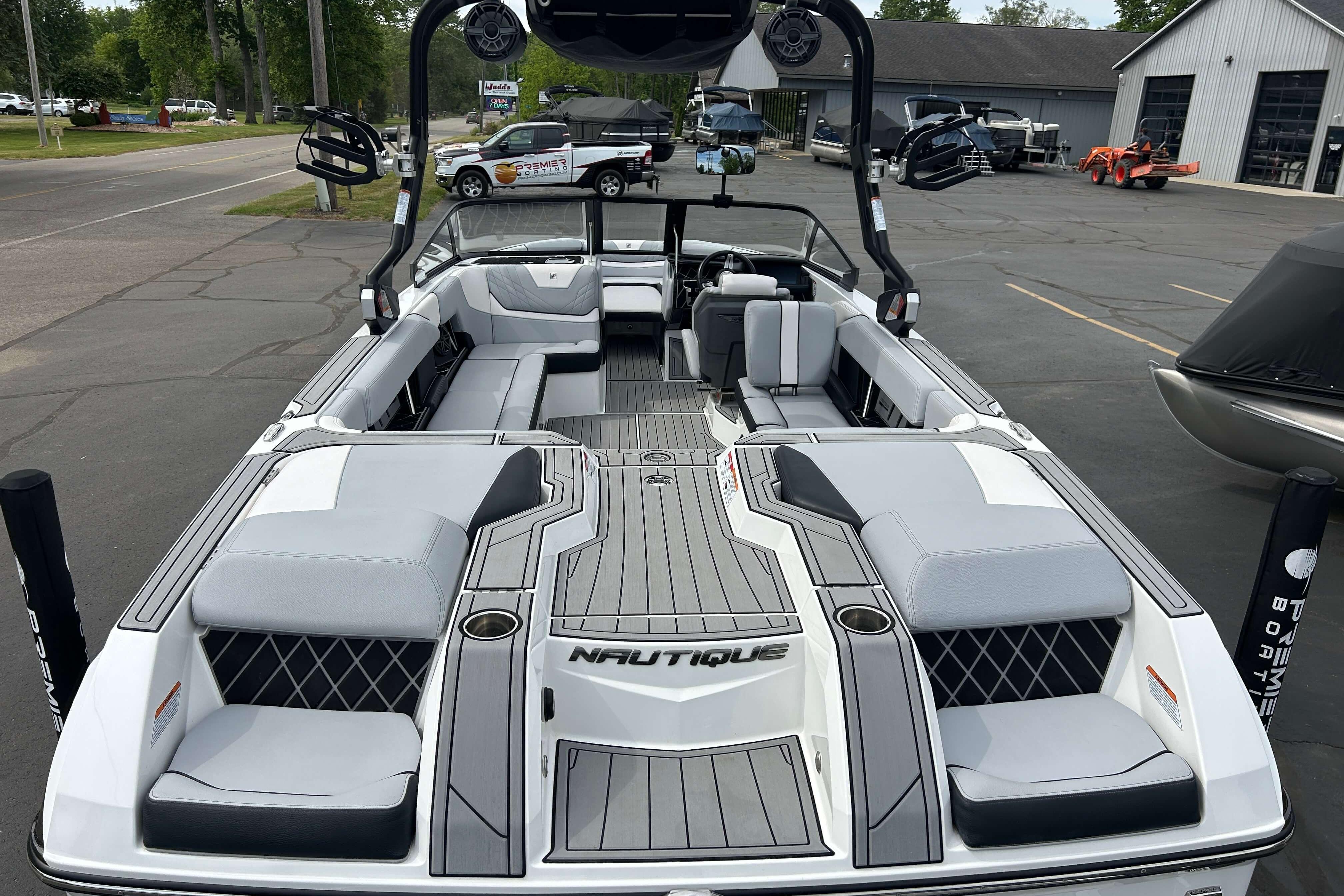 2021 Nautique Super Air Nautique GS24 boat with spacious seating and sleek design.