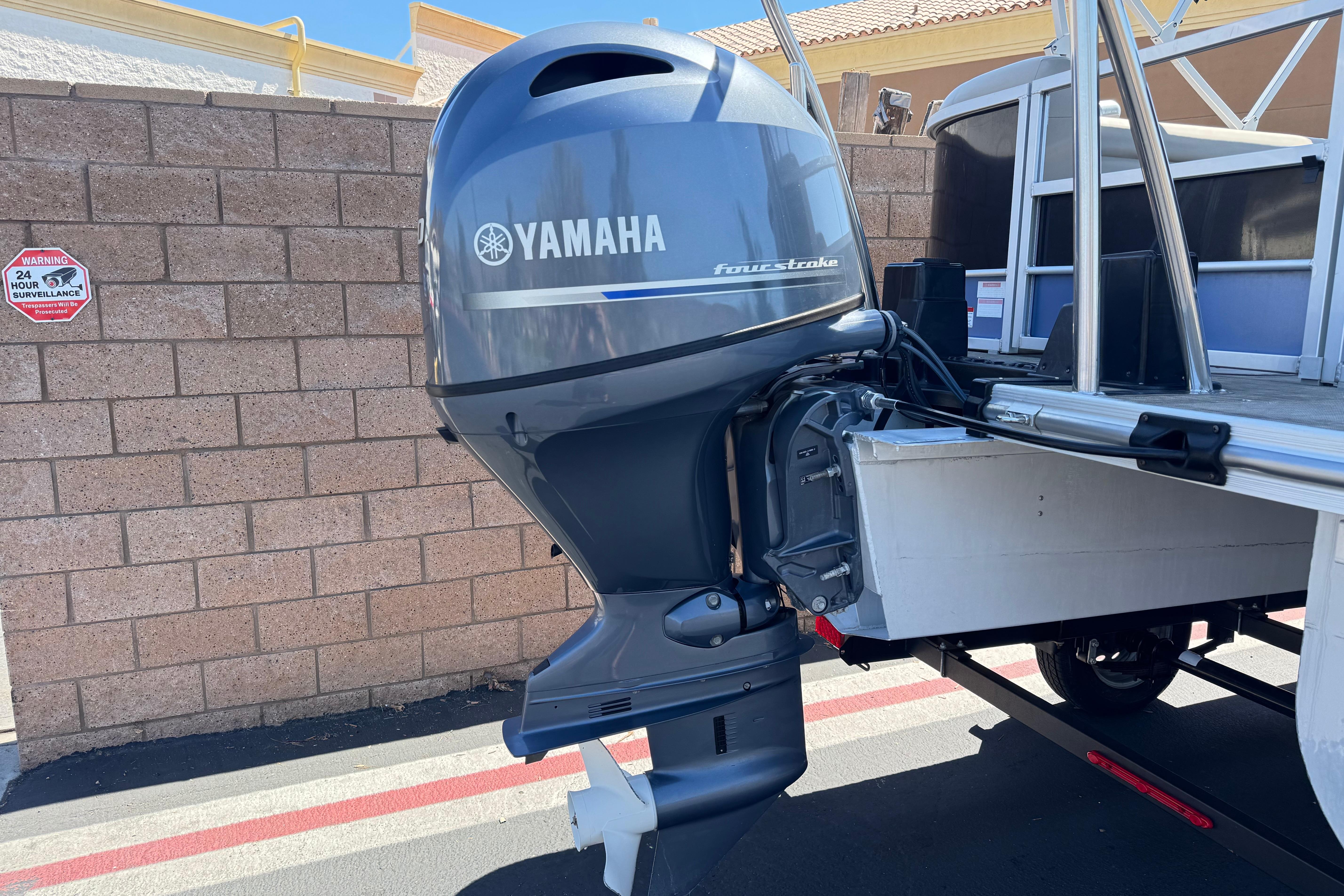 Yamaha four-stroke outboard motor on 2021 SunCatcher Select 20RCX boat.