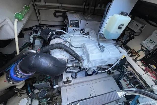 Engine compartment of a 2016 Sea Ray Sundancer 510 yacht, showcasing mechanical components.
