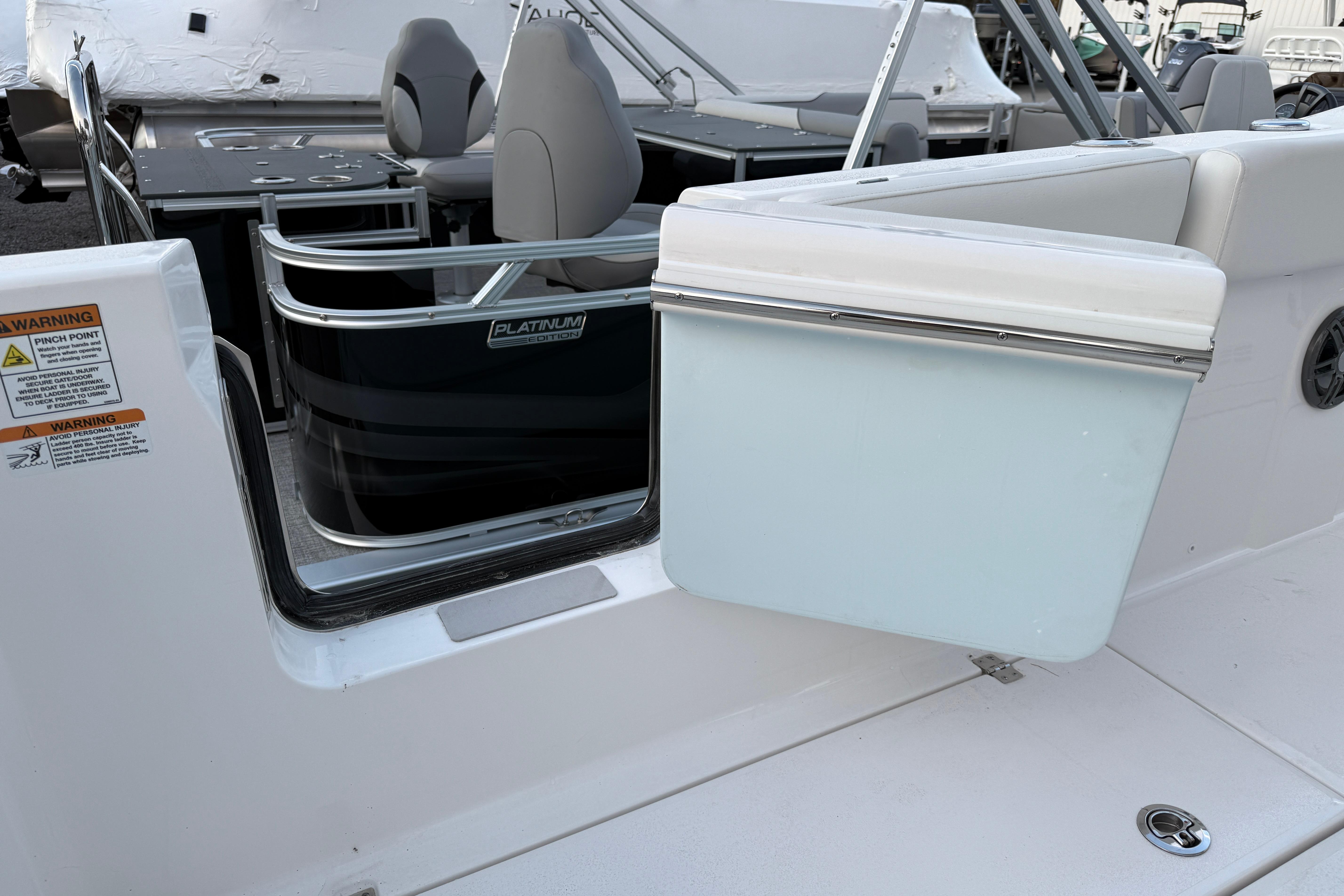 2026 Sea Fox 268 Commander boat interior with seating and storage features.