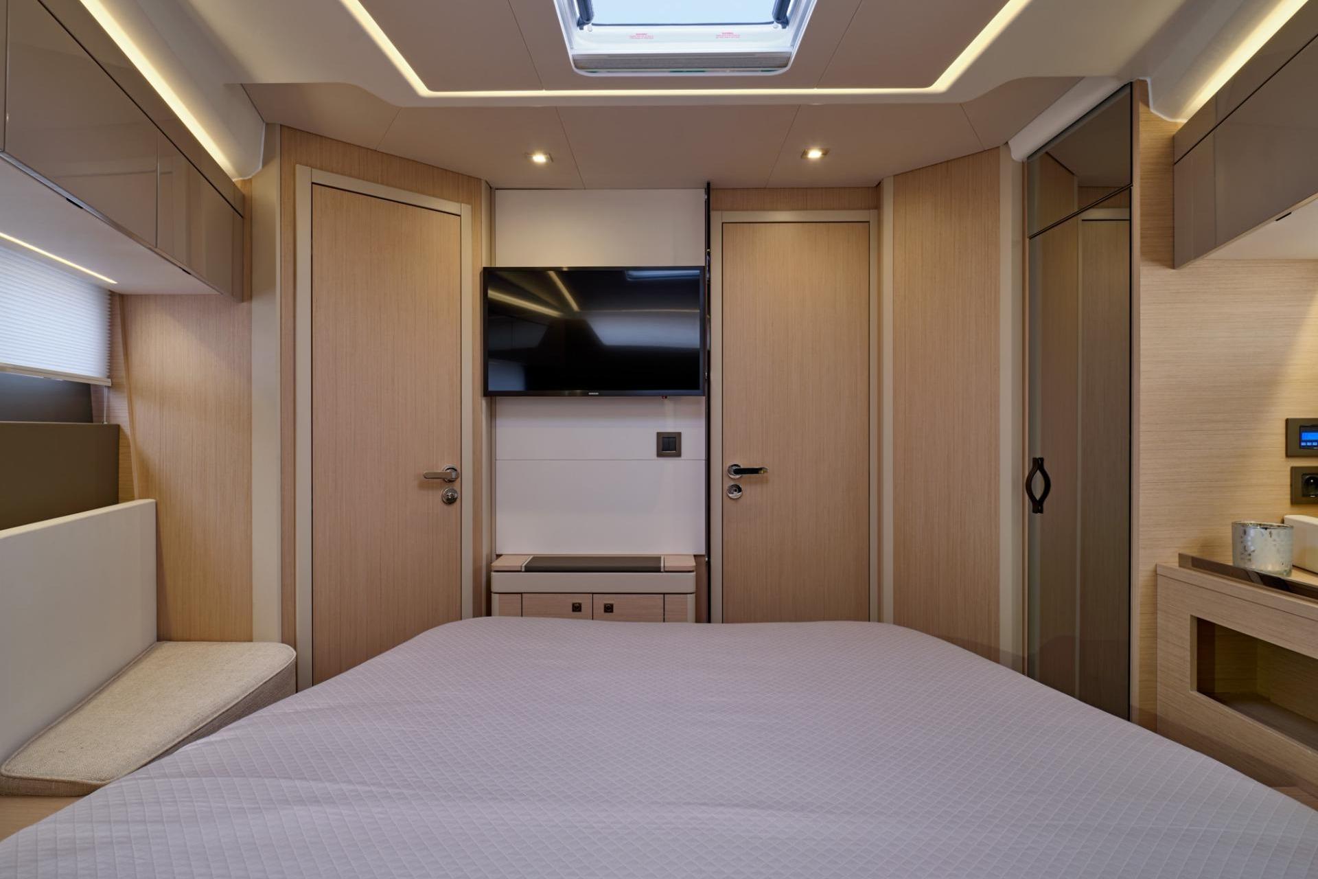 Luxurious interior cabin of 2027 Jeanneau DB/43 OB yacht with modern amenities.