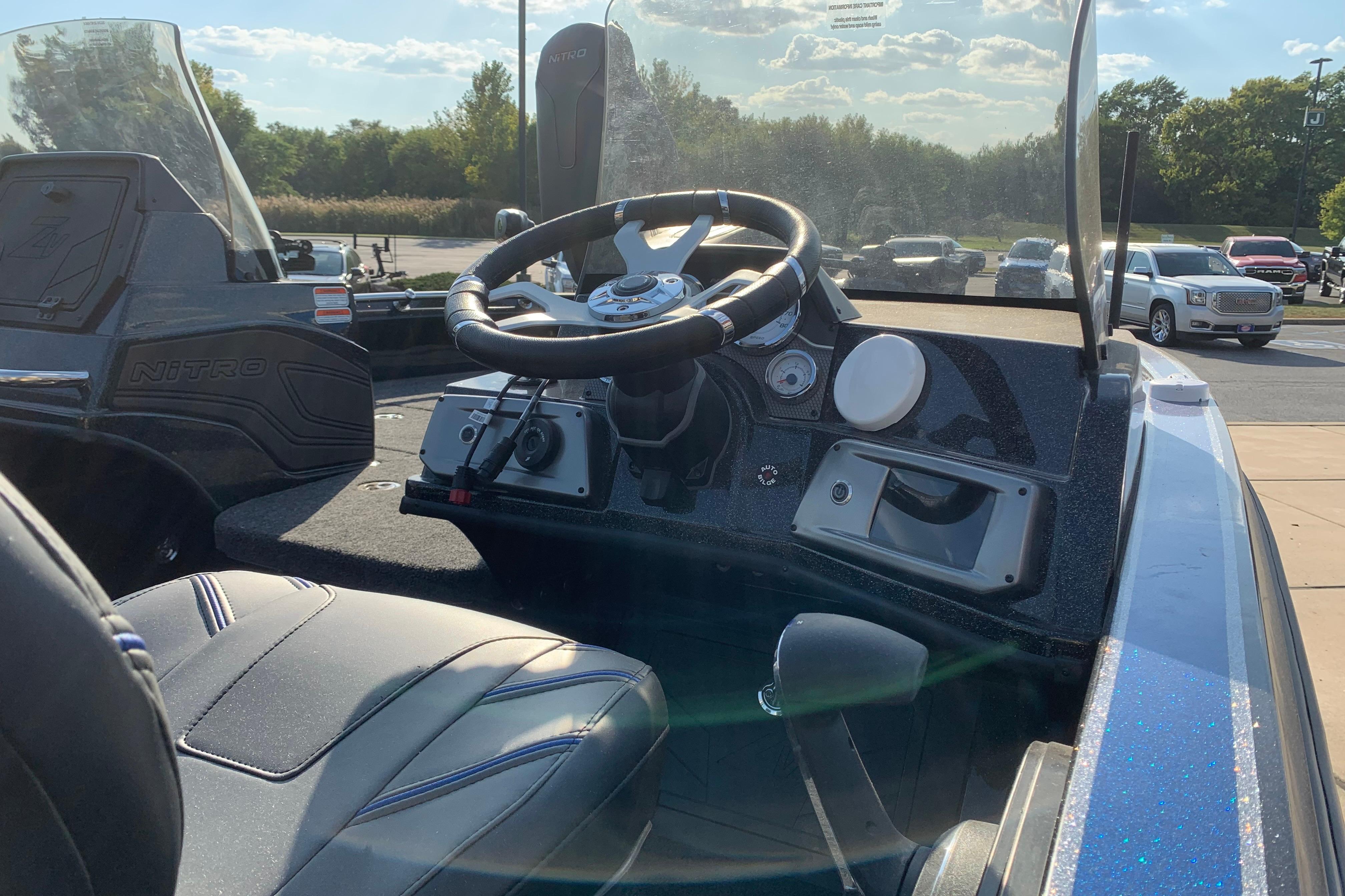 2025 Nitro ZV20 boat interior with steering wheel and dashboard controls.