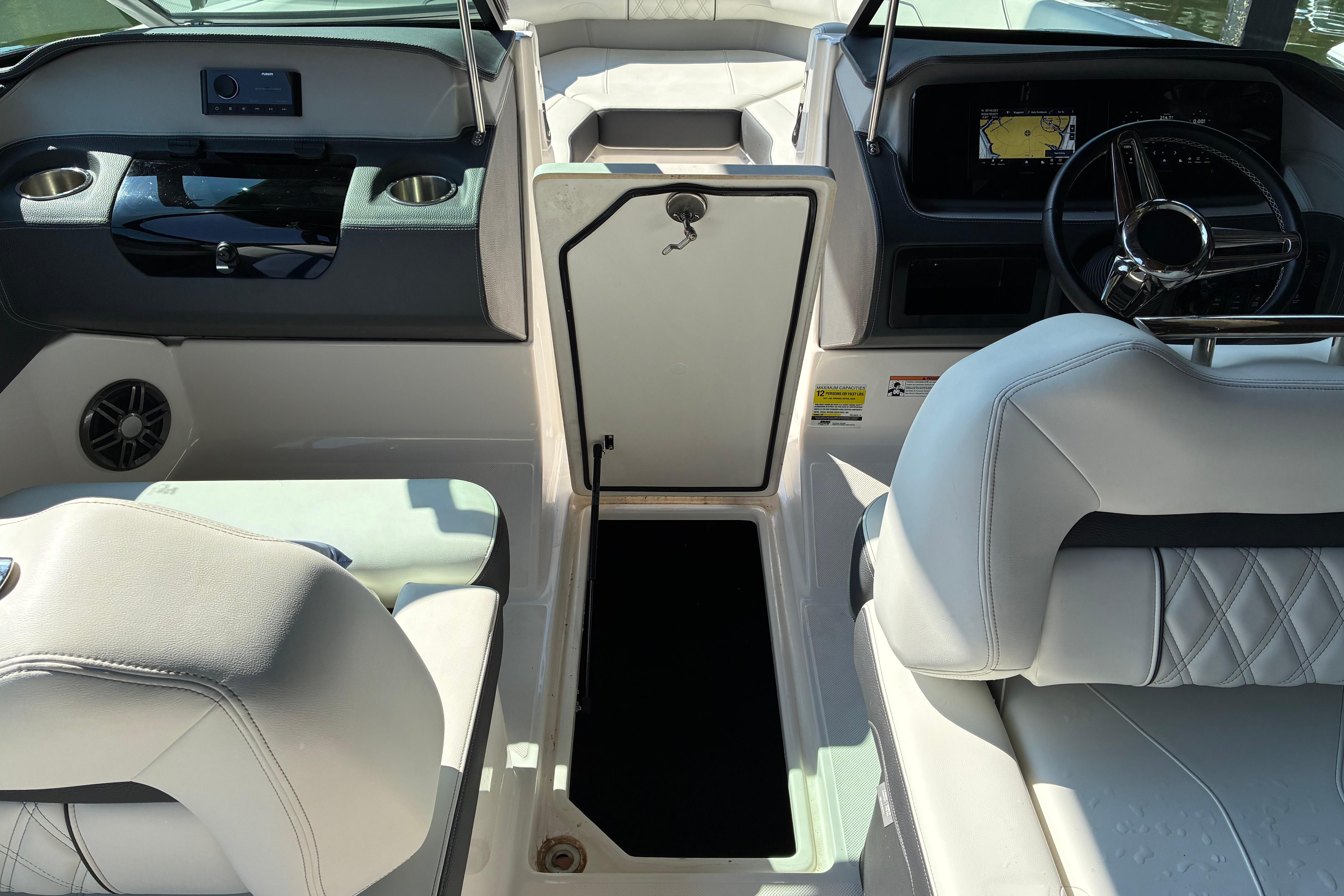 Interior of 2025 Regal LS2 boat with modern dashboard and seating.