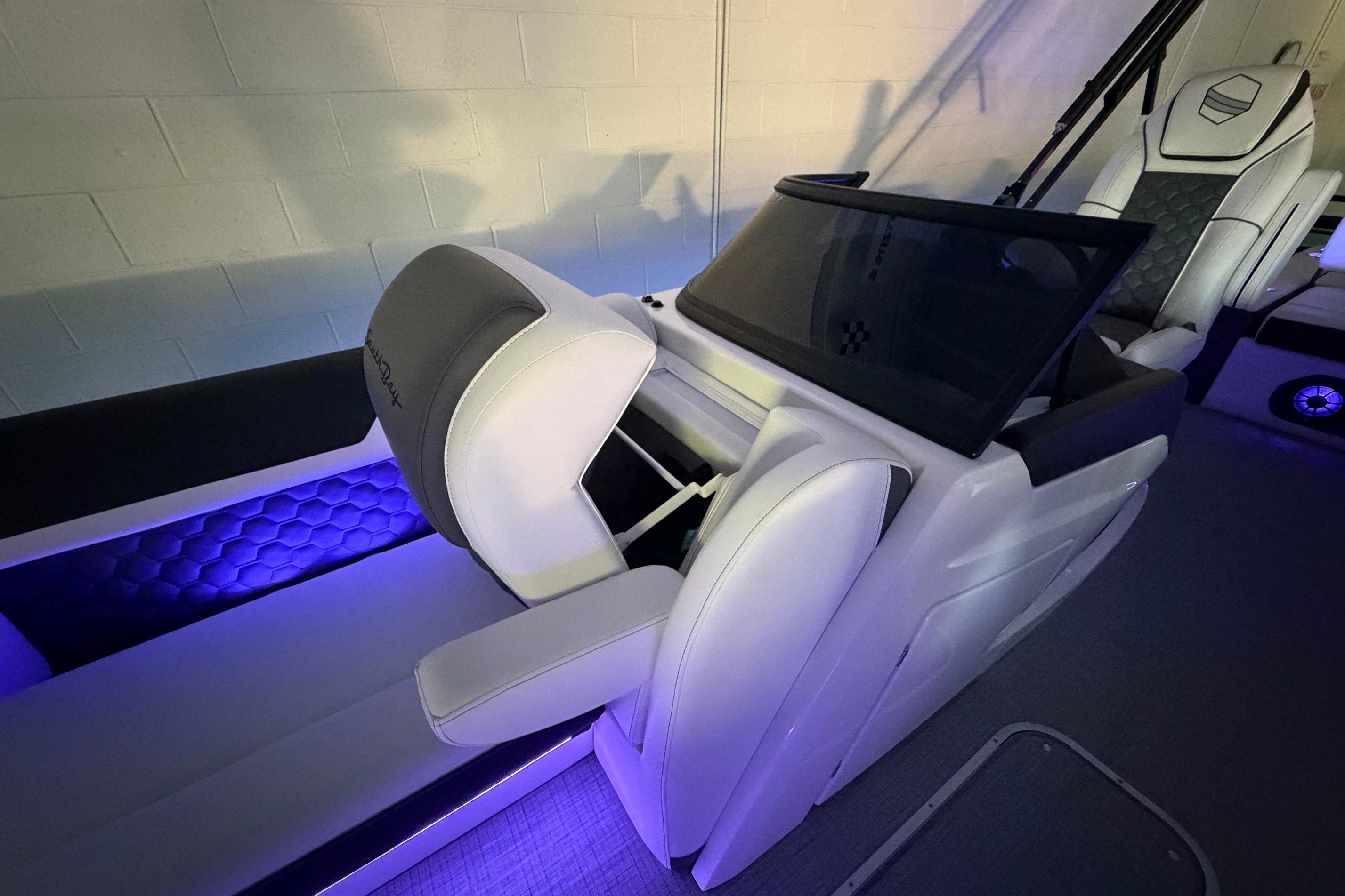 Luxurious interior of 2026 South Bay 525SB2 boat with modern seating and ambient lighting.