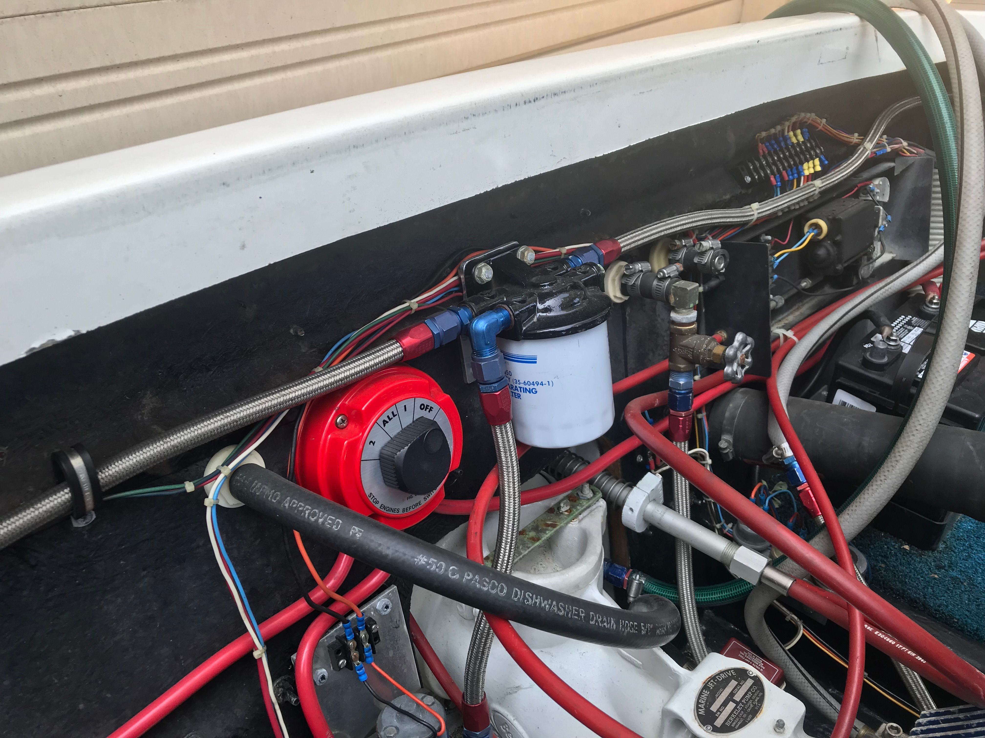 Engine compartment of a 1976 Tahiti Day Cruiser boat.