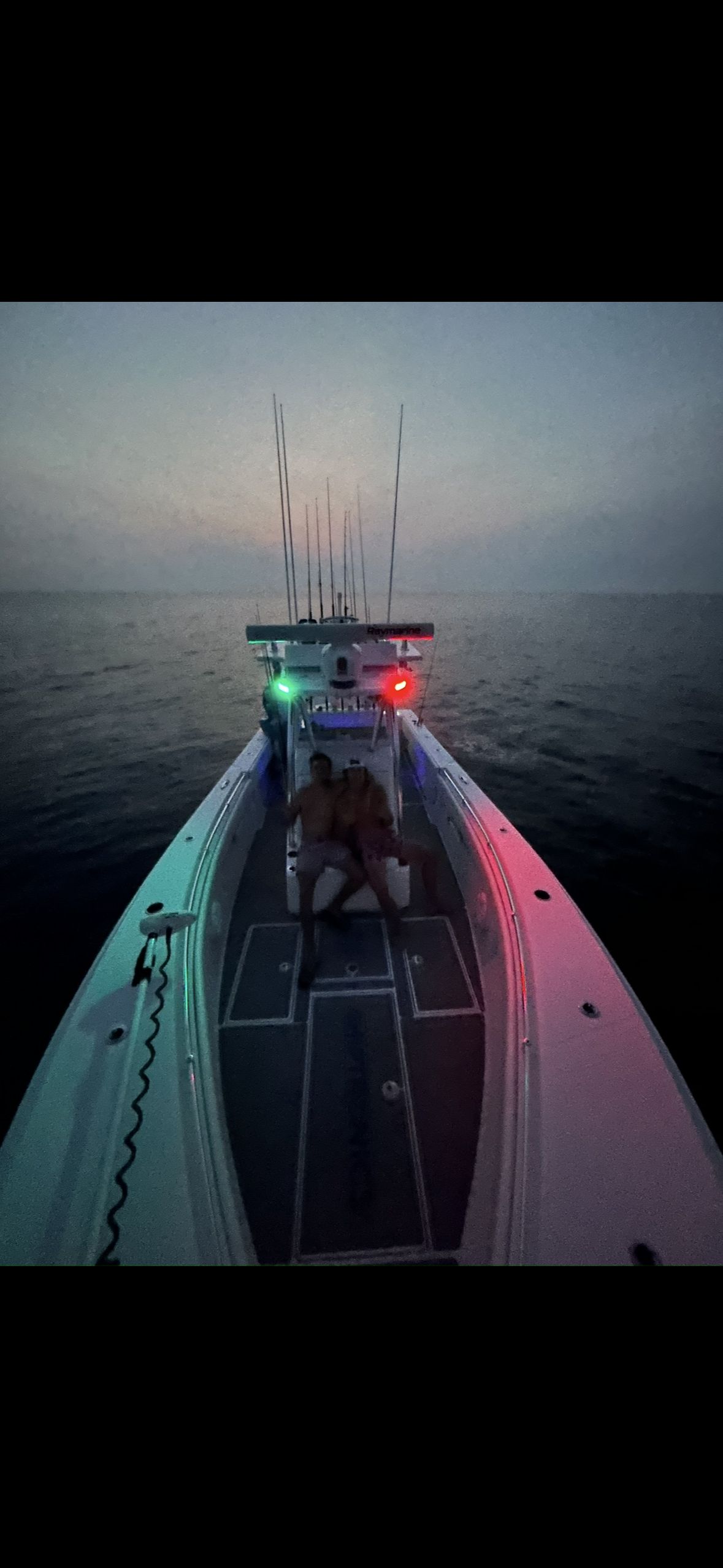 SeaHunter 31 Tournament boat at sunset on the water.