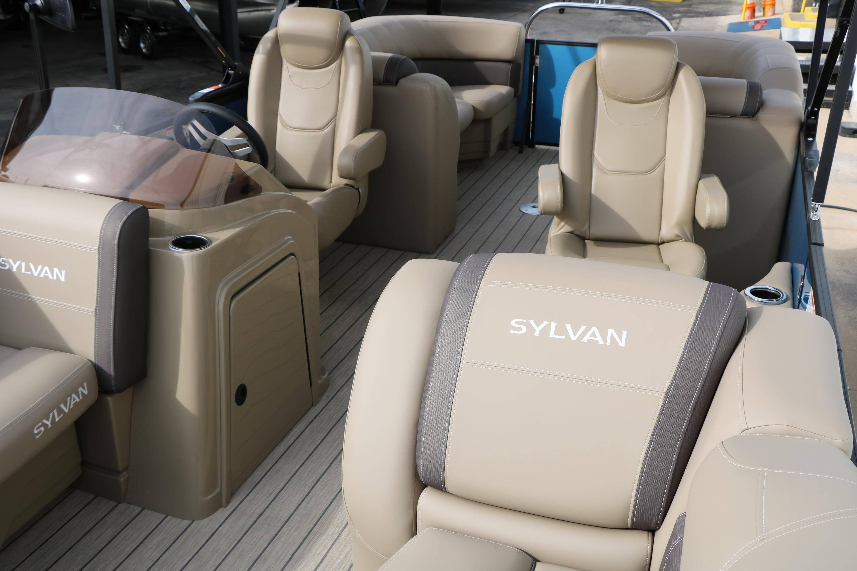 Luxurious interior of 2026 Sylvan Mirage 822 LZ pontoon boat with plush seating.