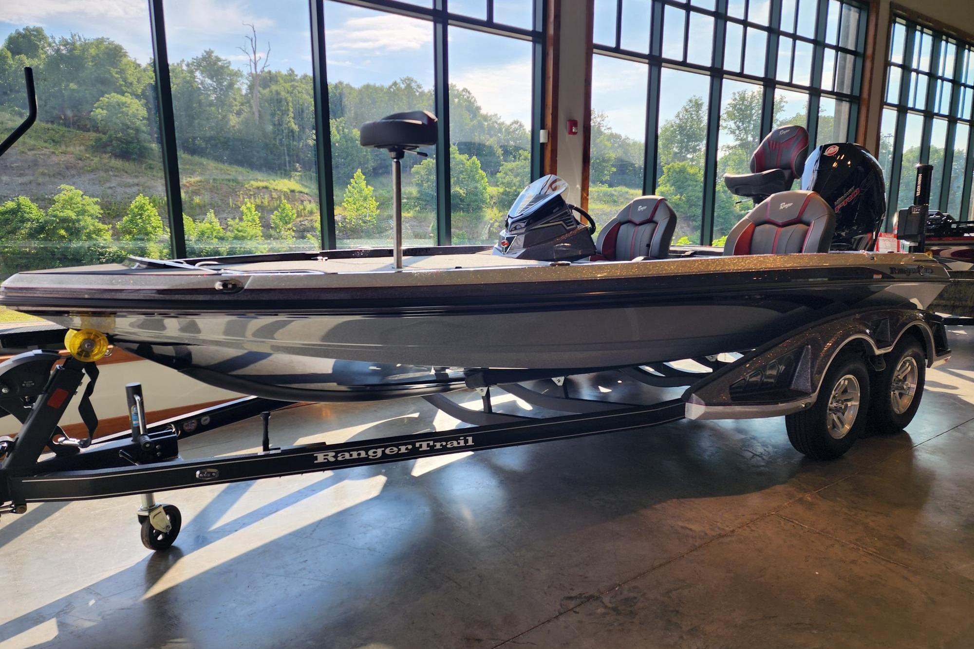 2026 Ranger Z519R boat on trailer in showroom with scenic window view.