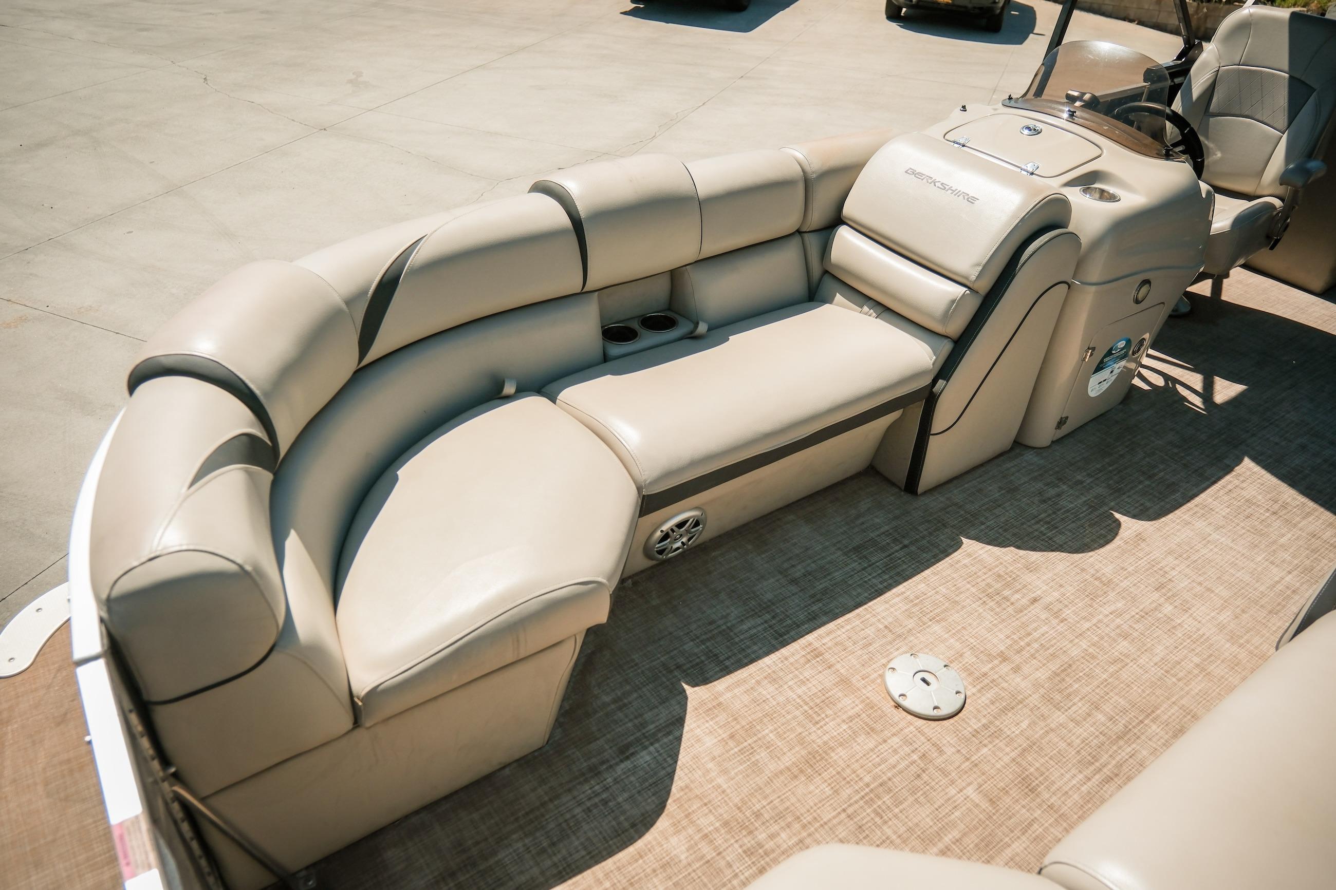 2019 Berkshire 25CLE STS pontoon boat with beige seating and spacious interior layout.