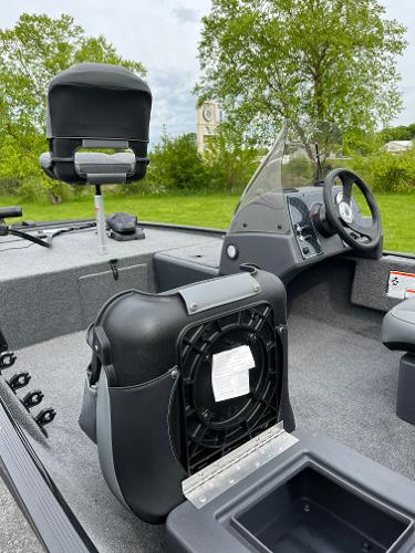 2025 Tracker Bass Tracker Classic XL interior with seating and steering console.