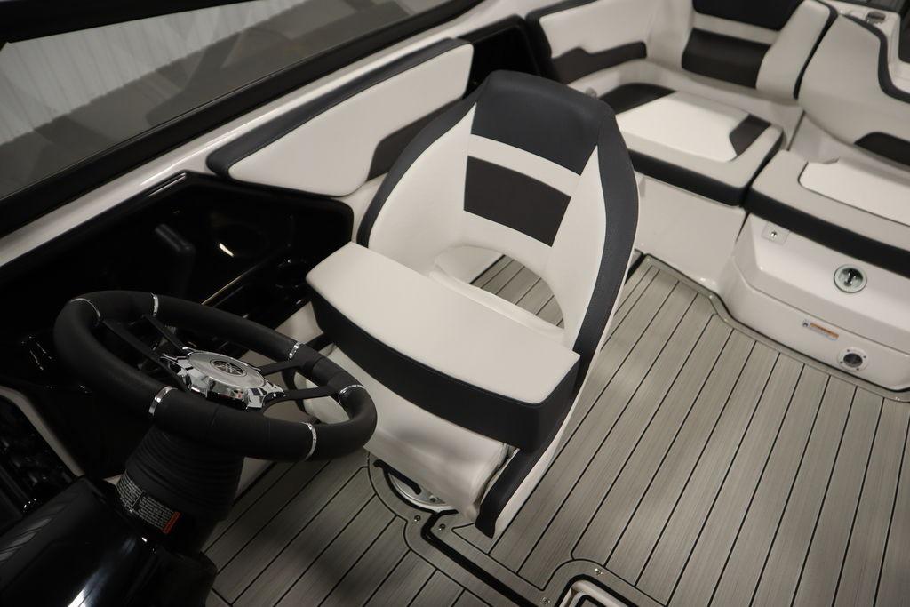 2026 Yamaha Boats 195S interior with sleek seating and modern steering wheel design.