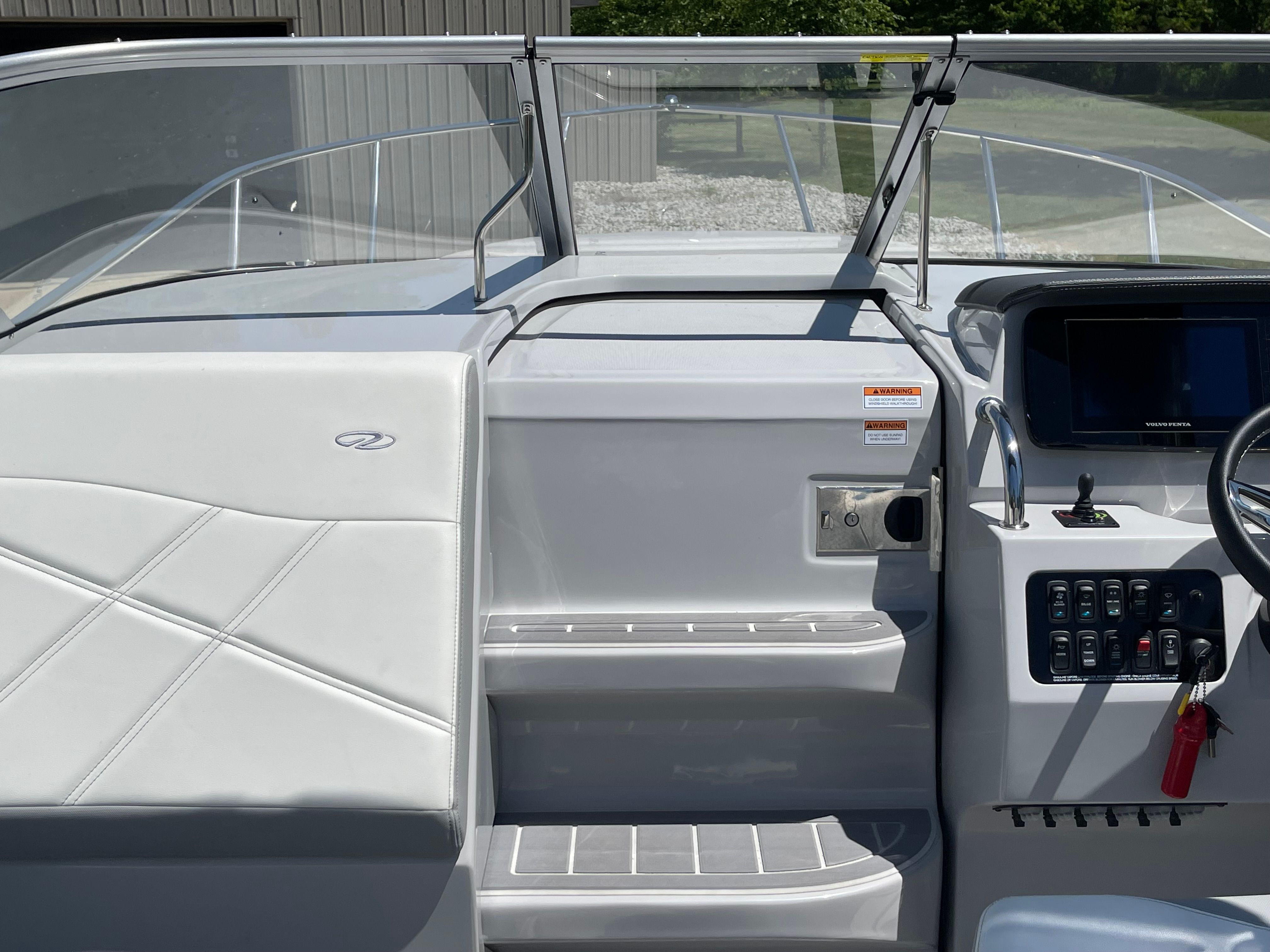 Interior view of 2022 Regal 26 Express boat cockpit.