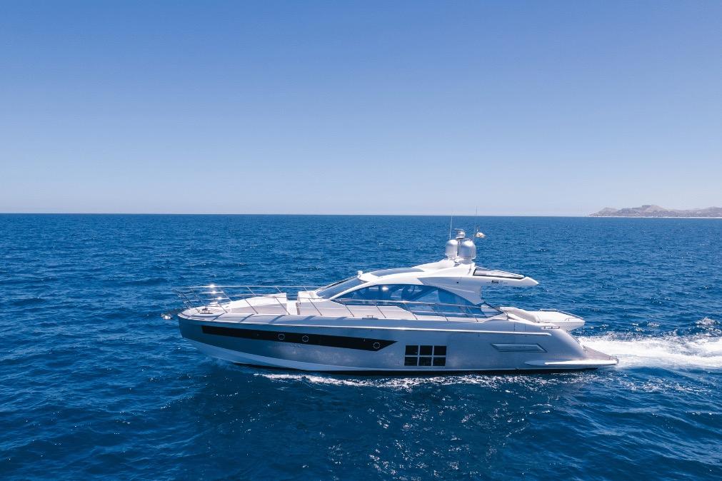 Luxury Azimut 60 yacht cruising on open sea, 2020 model.