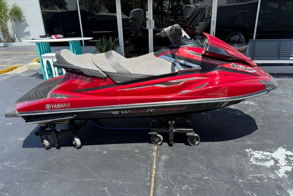 2019 Yamaha VX Limited WaveRunner in vibrant red on display outdoors.