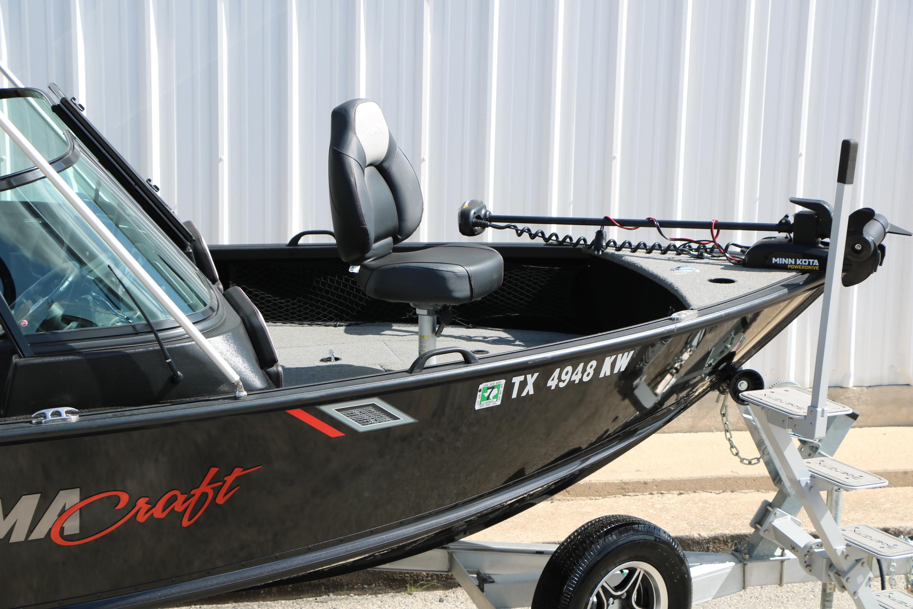 2023 Alumacraft Competitor FSX 185 boat on trailer, featuring a Minn Kota trolling motor.