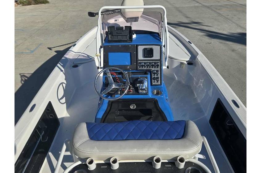 2020 Blue Wave 2400 PureBay boat interior with modern dashboard and steering wheel.