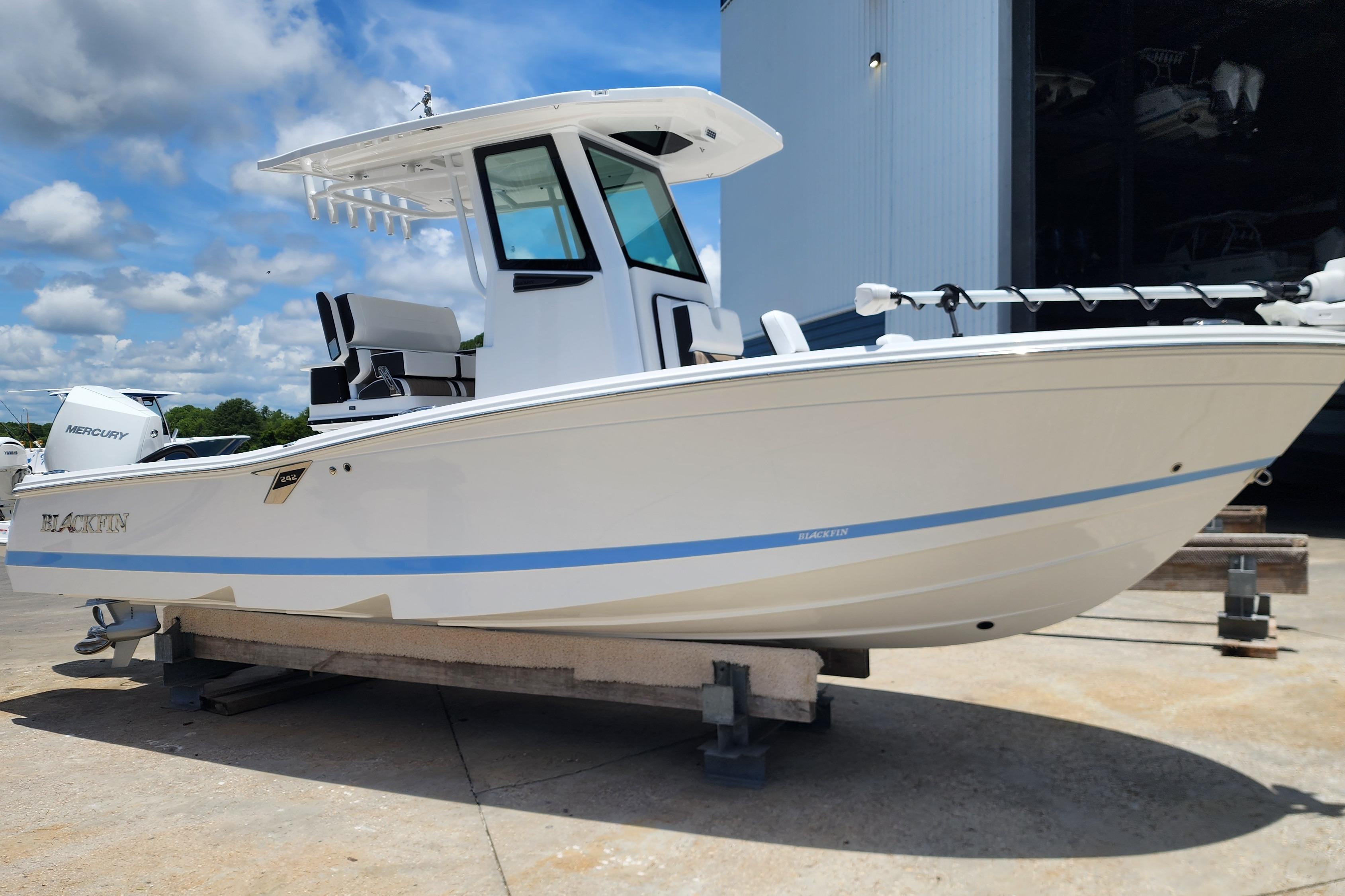 2026 Blackfin 242HB boat on display, featuring sleek design and modern features.
