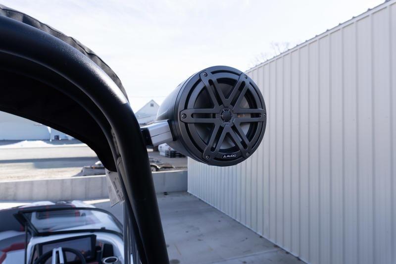 Speaker on 2026 Scarab 255 LX Wake boat, mounted on a metal frame.