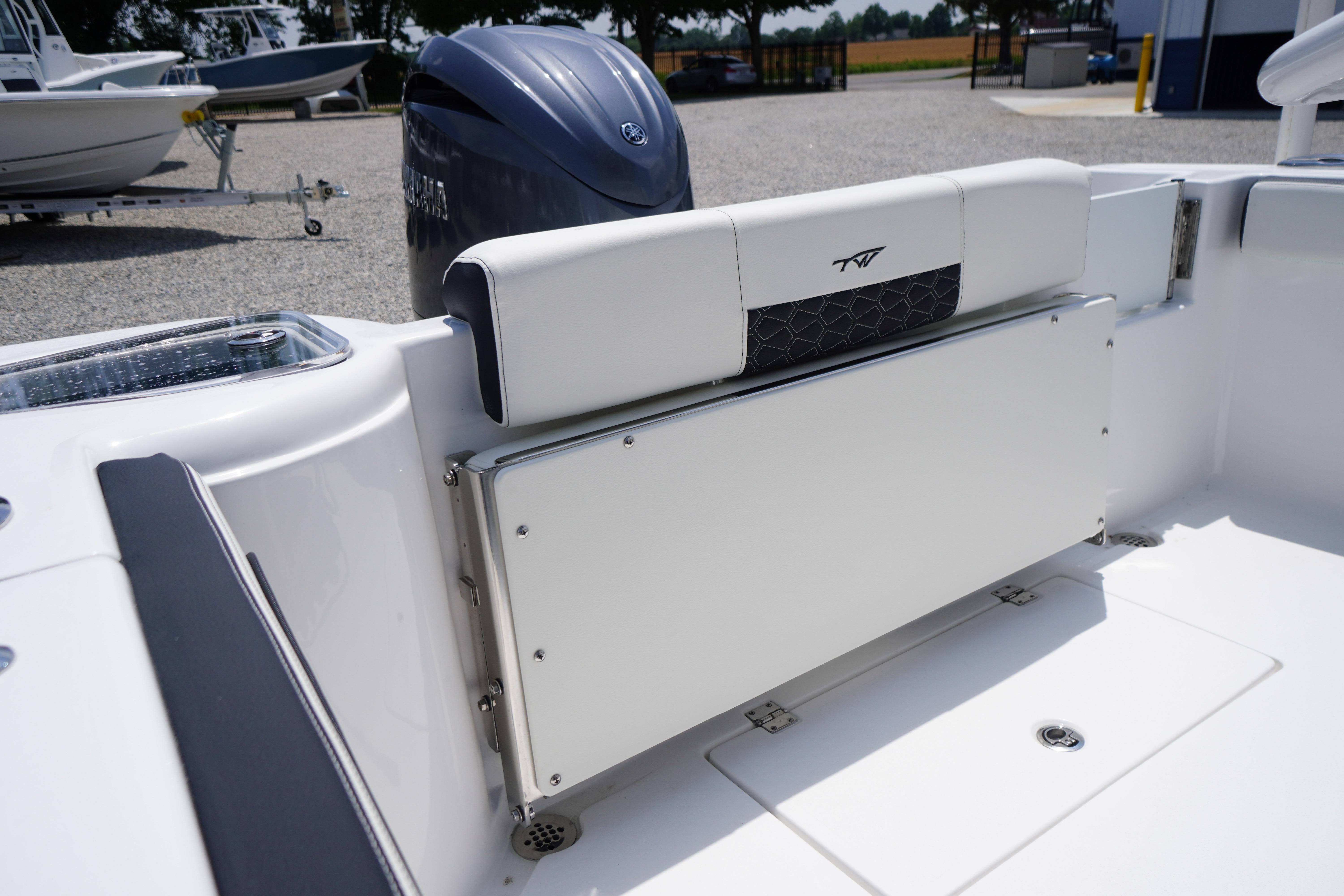 2027 Tidewater 220 CC Adventure boat interior with foldable seating and Yamaha engine.