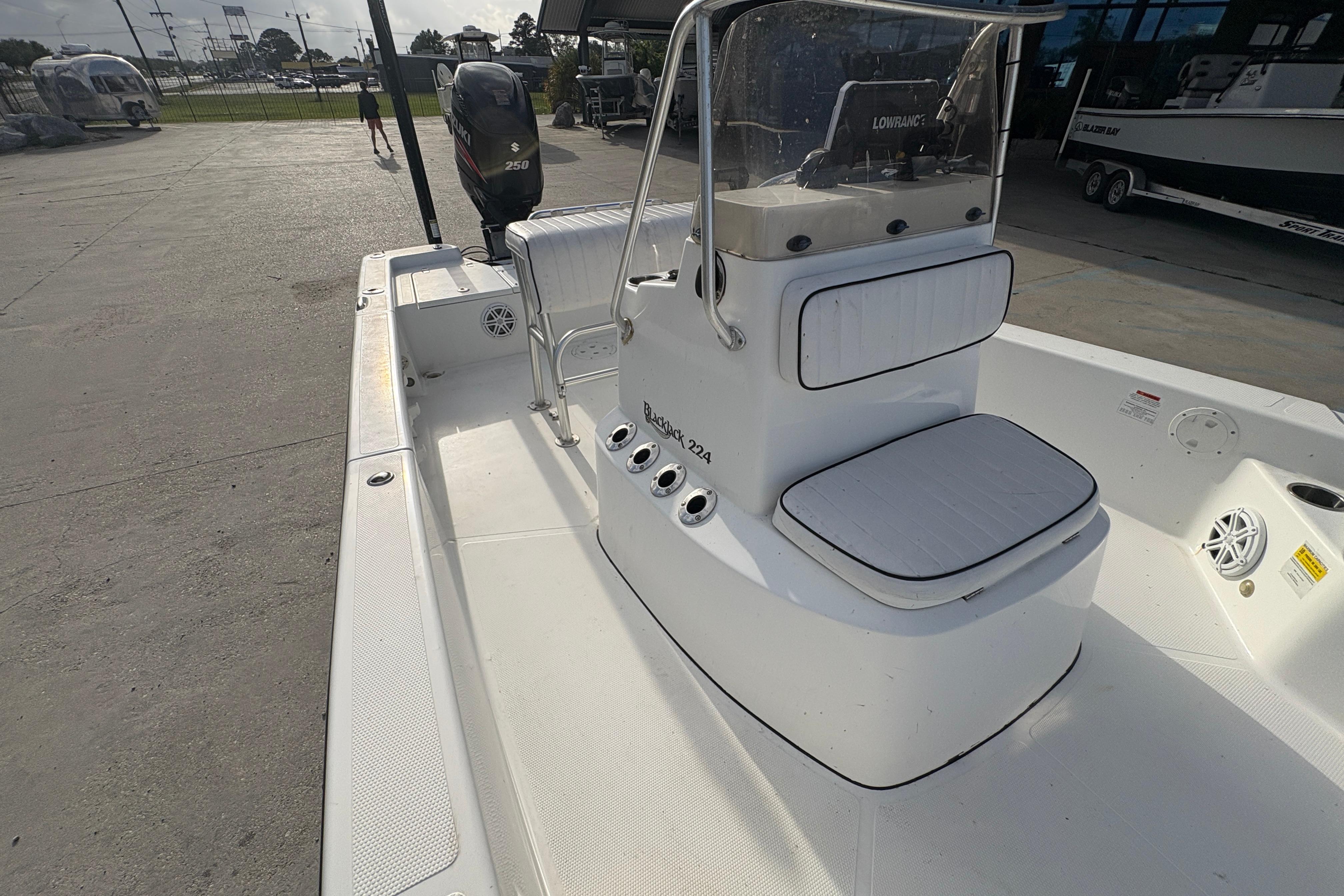 2012 BlackJack 224 boat with center console and Suzuki 250 outboard motor.