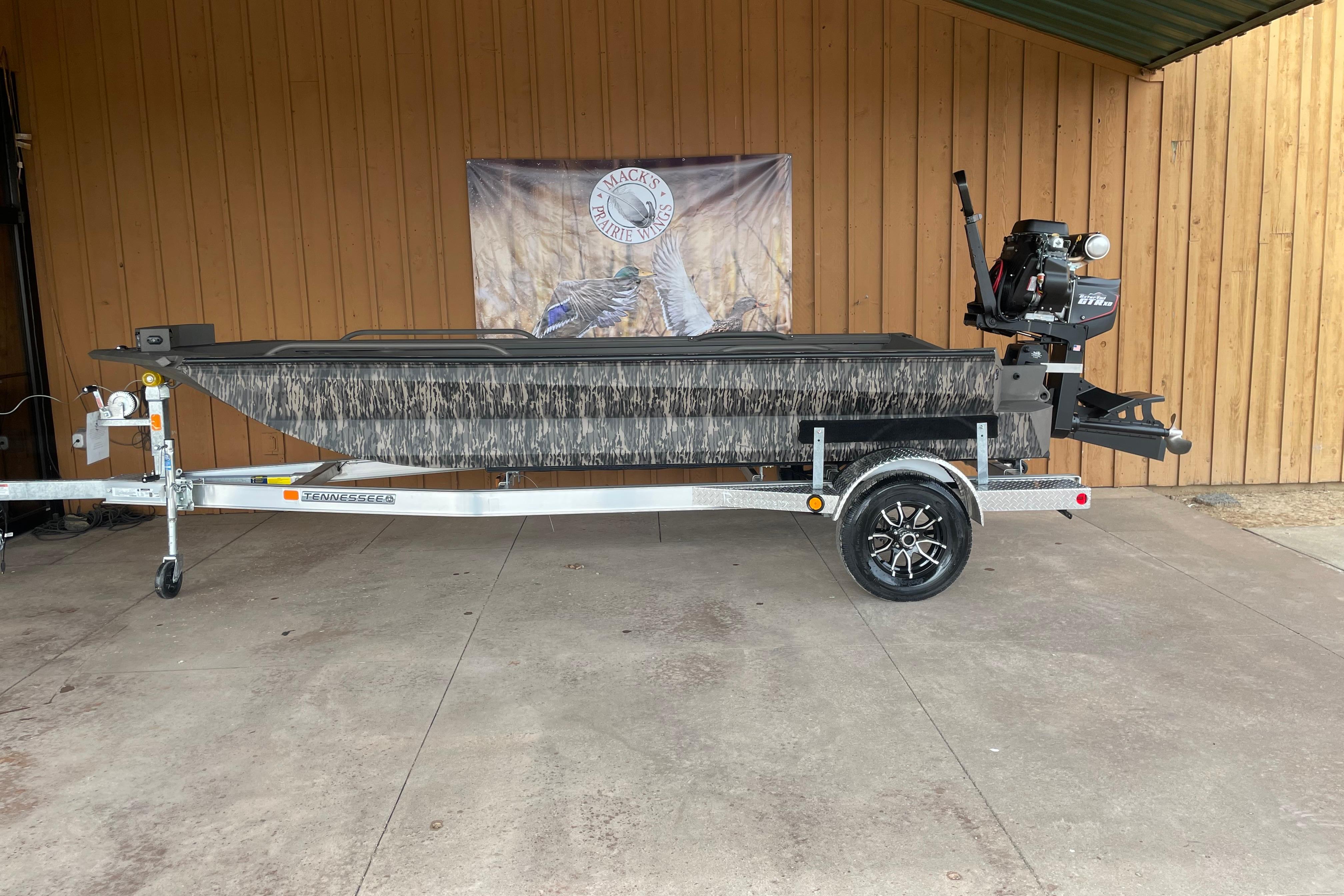 2026 Reaper Boats 753 Timber Reaper on trailer, displayed outdoors.