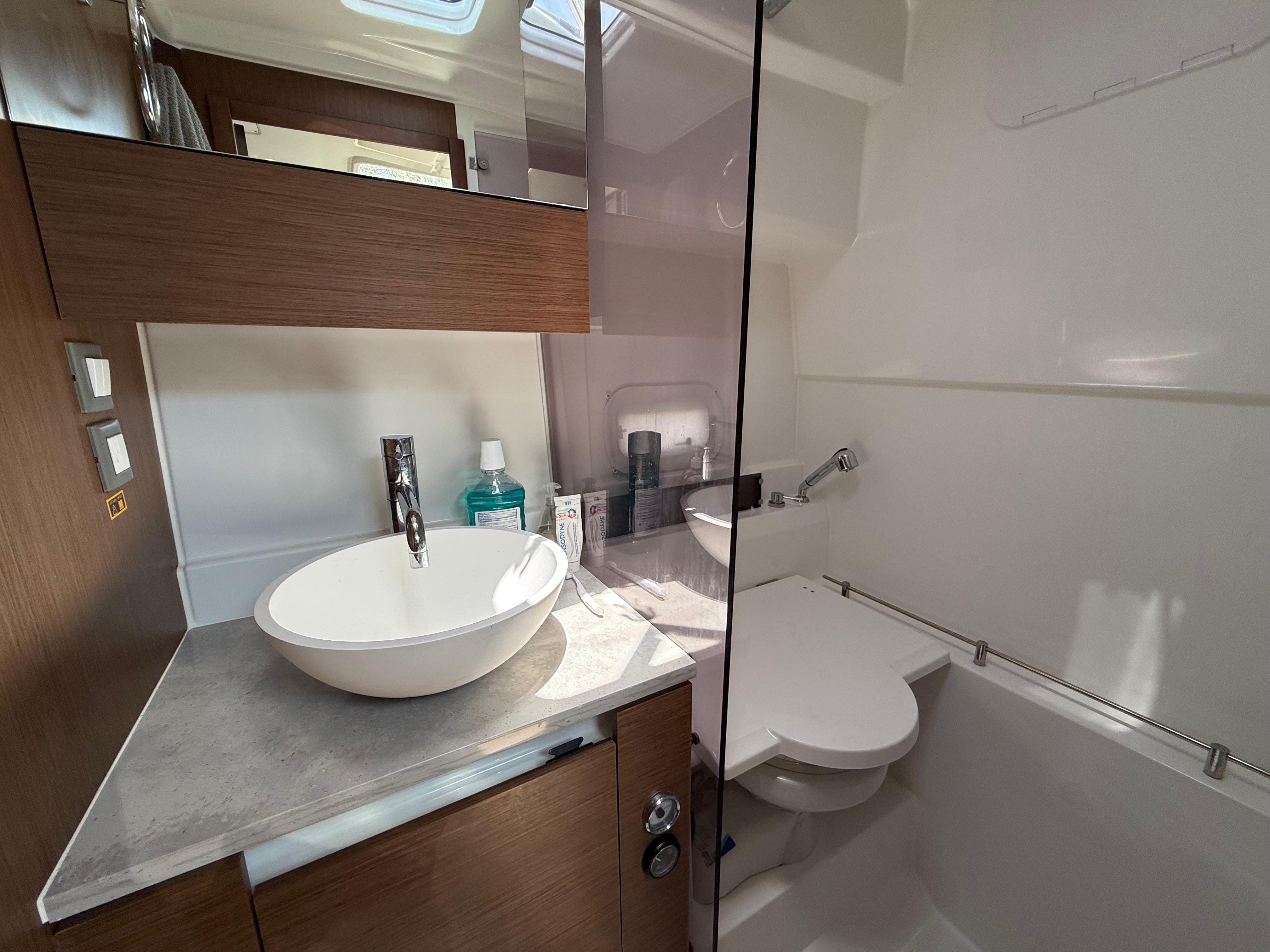 Modern bathroom in 2022 Jeanneau Leader 10.5 WA Series 2 boat, featuring sleek design.