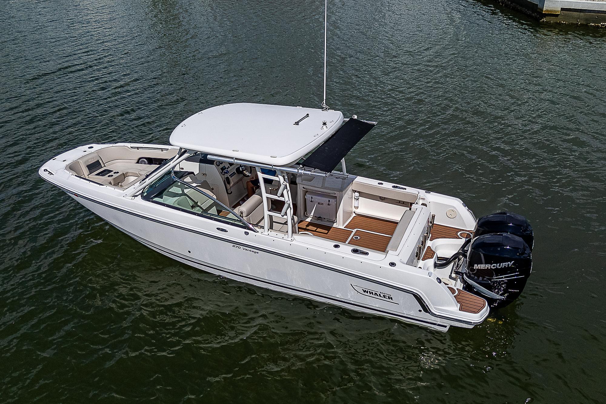 2018 Boston Whaler 270 Vantage boat on water, featuring dual Mercury engines.