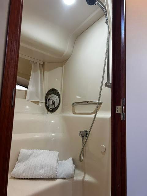Shower in Sea Ray 44 Sundancer 2006 yacht bathroom.