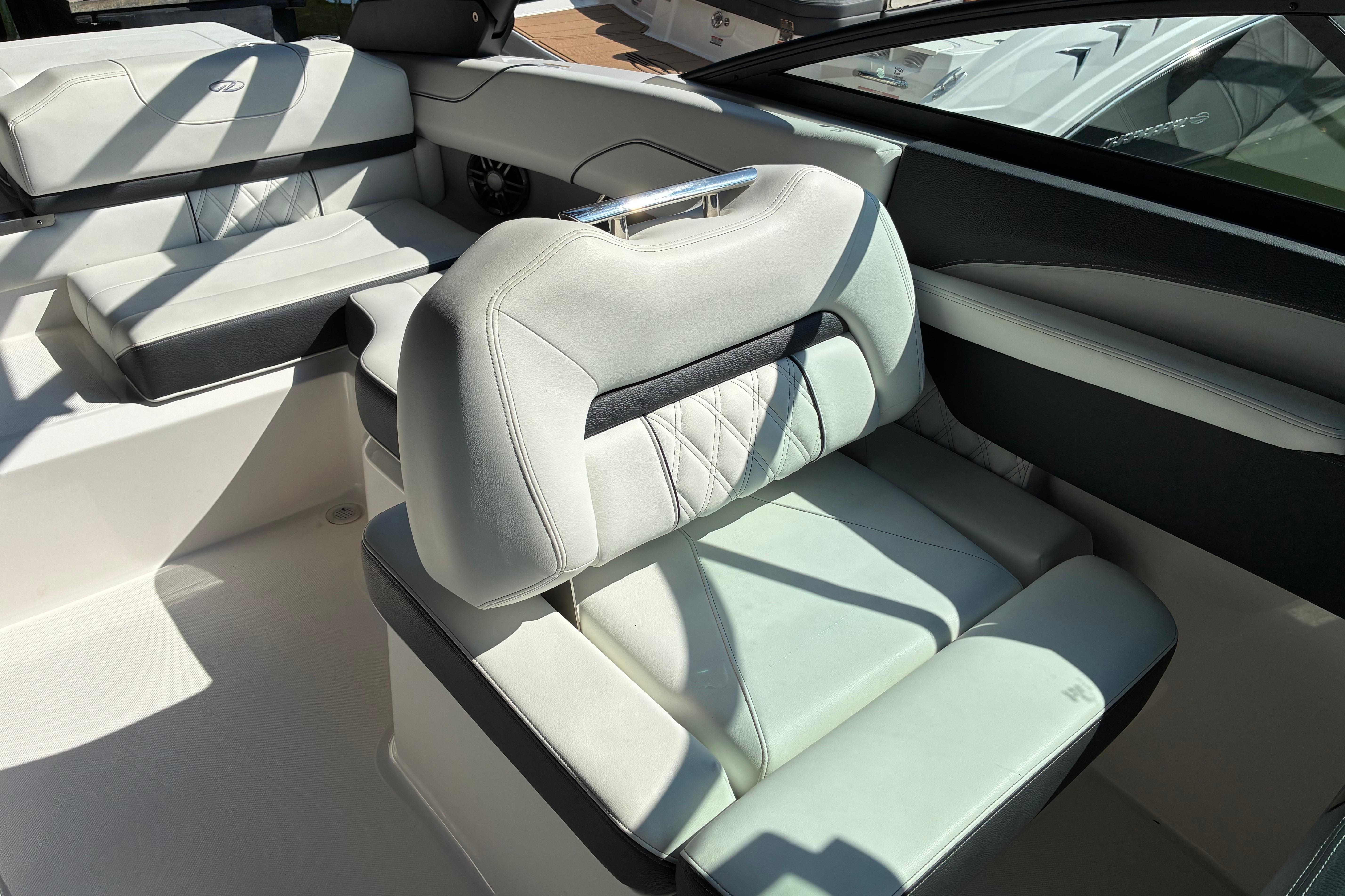 2025 Regal LS2 boat interior with luxurious white leather seating.