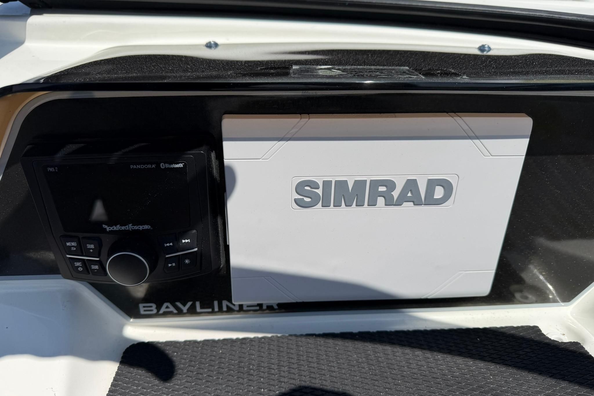 2026 Bayliner D20 dashboard featuring Simrad navigation and Rockford Fosgate audio system.