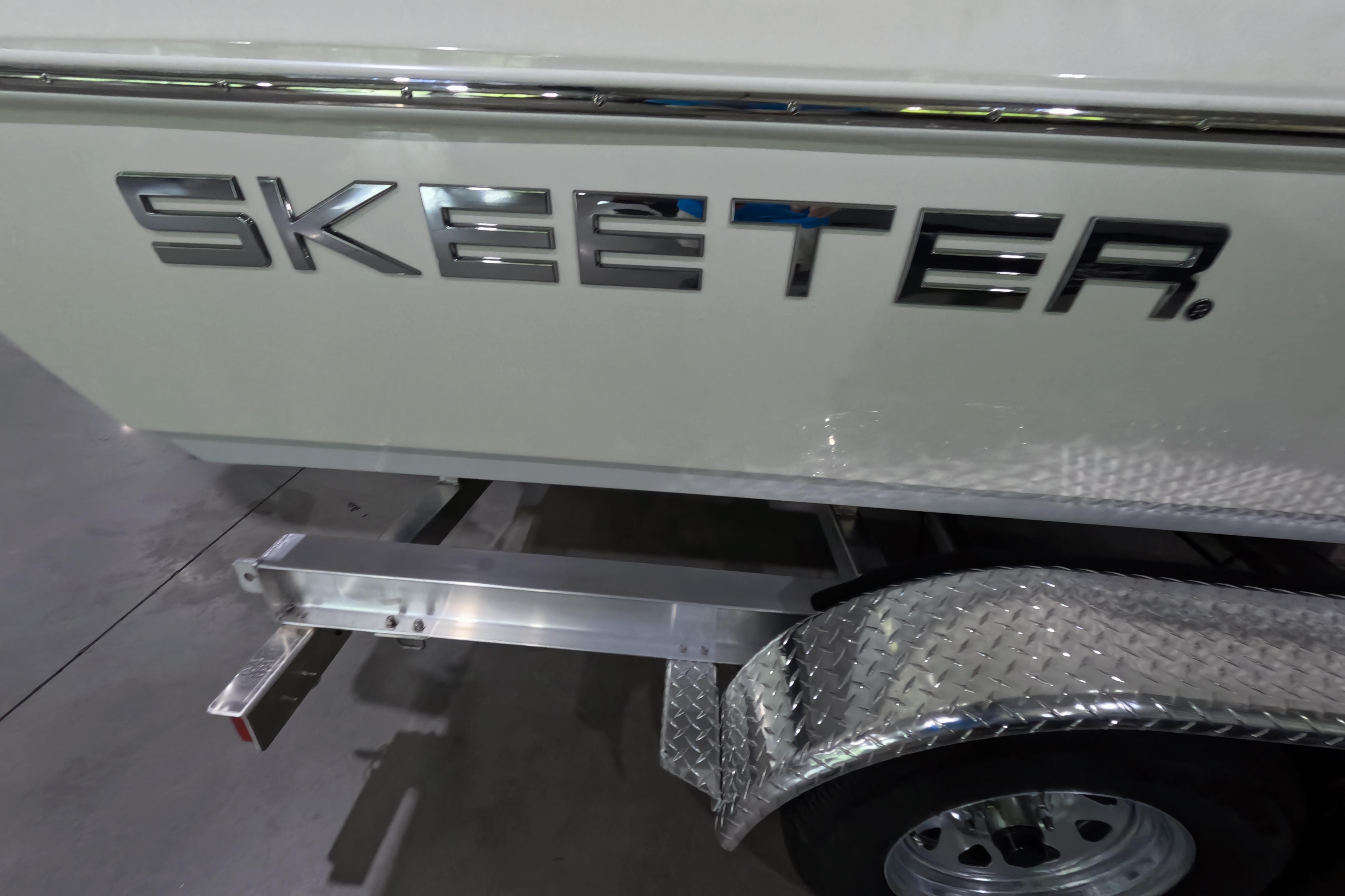 2026 Skeeter SX221 boat on a trailer, showcasing brand logo.