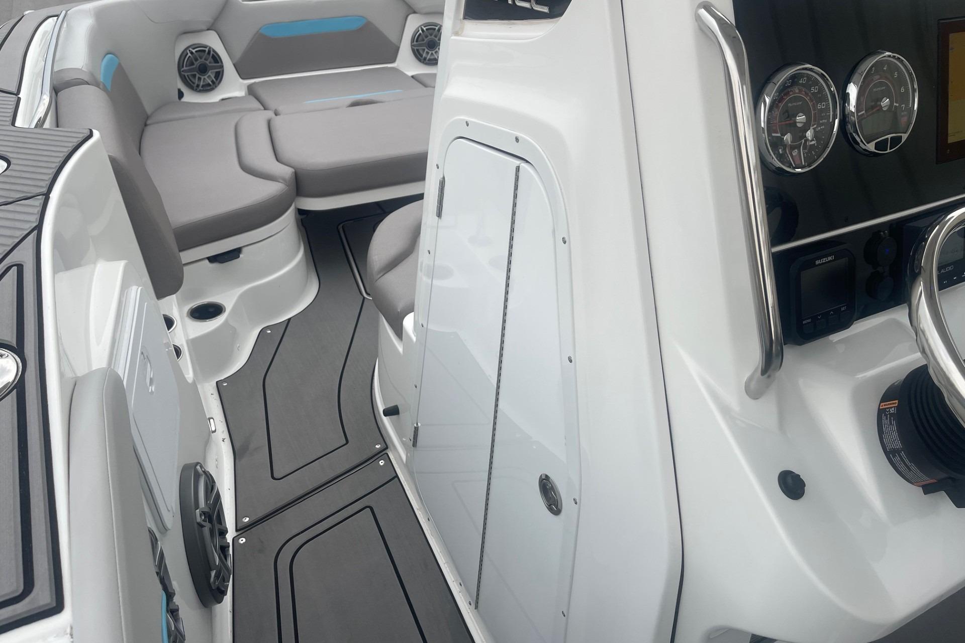 2025 Hurricane Center Console 24 OB boat interior with seating and control panel.