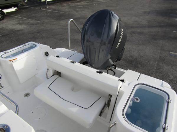 2025 Wellcraft 243 Fisherman boat with Yamaha outboard motor, featuring spacious deck layout.