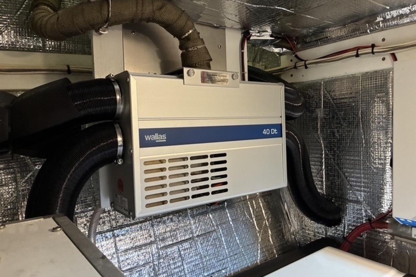 Wallas 40 Dt heater in 2000 Nordic Tug 37 engine room with insulated walls.
