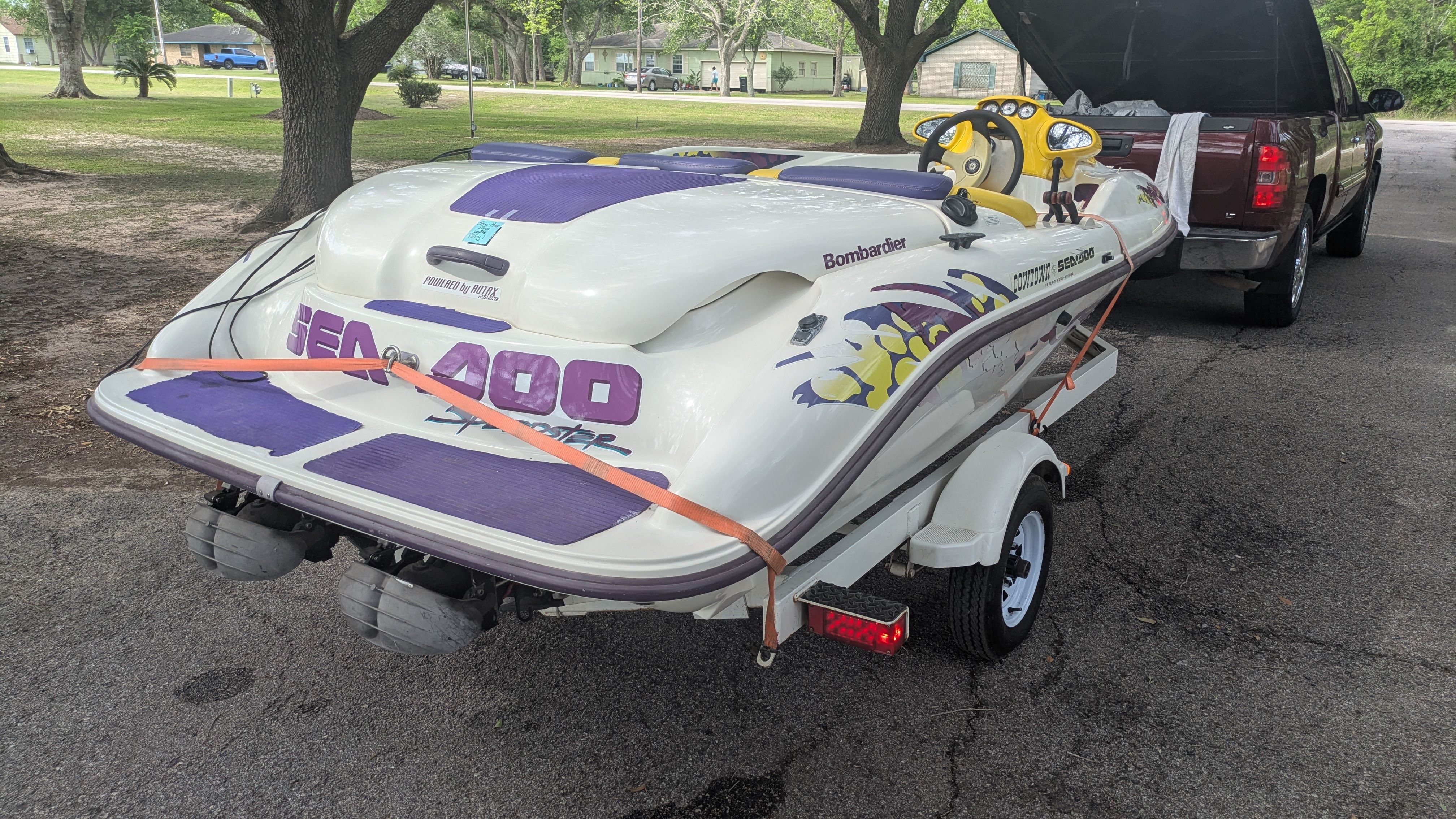 A 1995 Bombardier SeaDoo SPEEDSTER on a trailer, ready for transport.