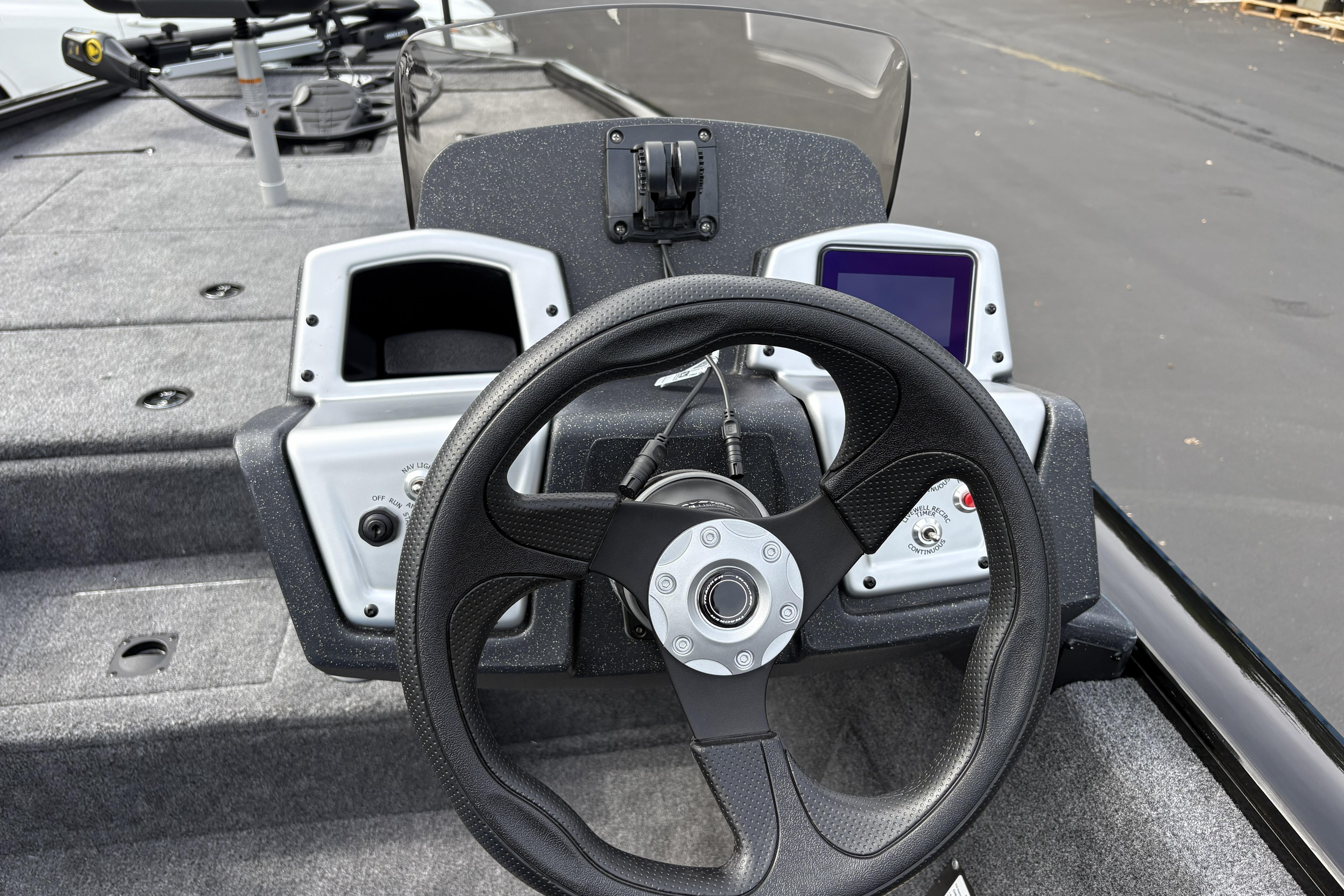 Steering console of 2026 Tracker Pro Team 195 boat with modern controls.