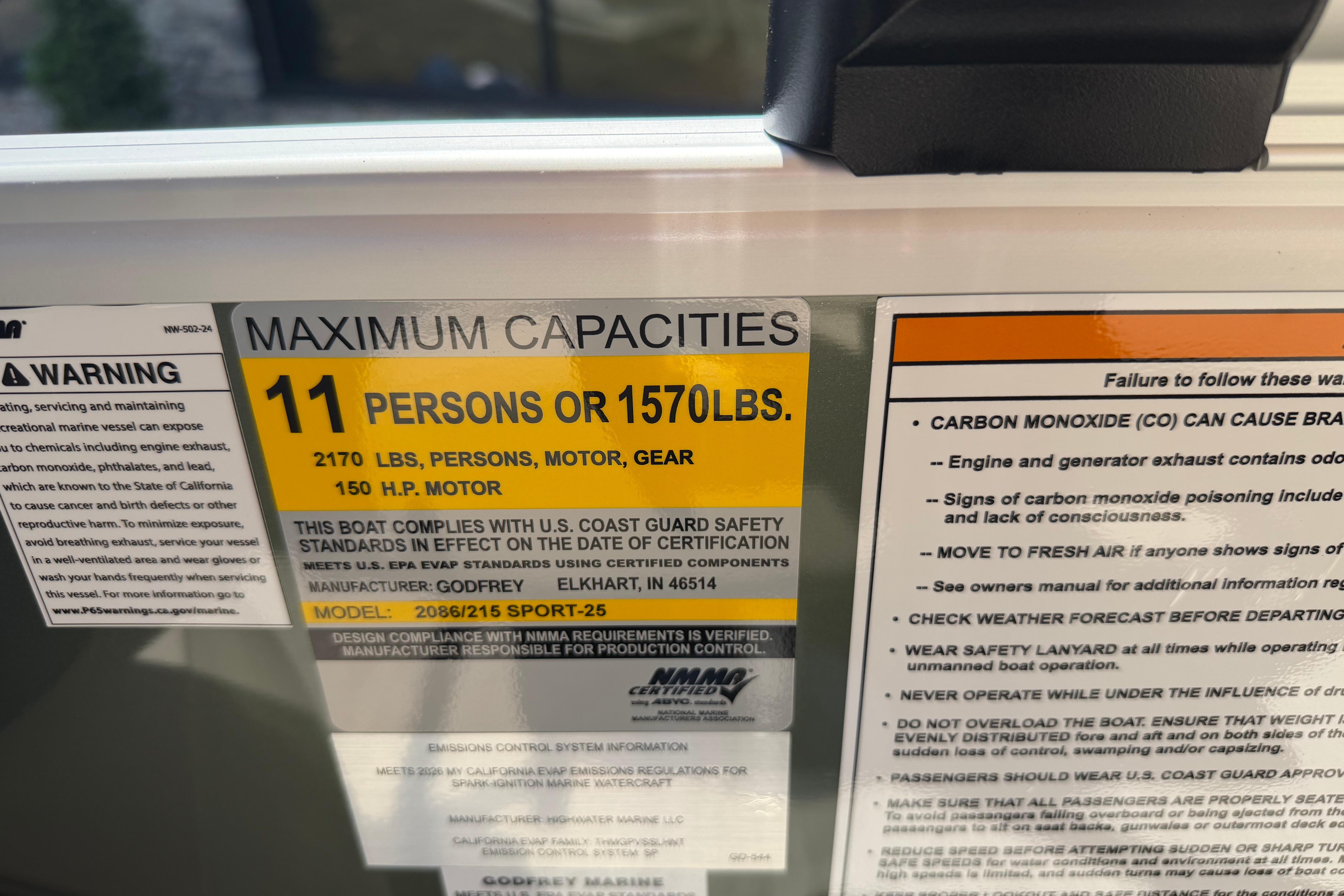 Boat capacity label for Godfrey SW 2086 SBC, 2026 model, 11 persons or 1570 lbs.