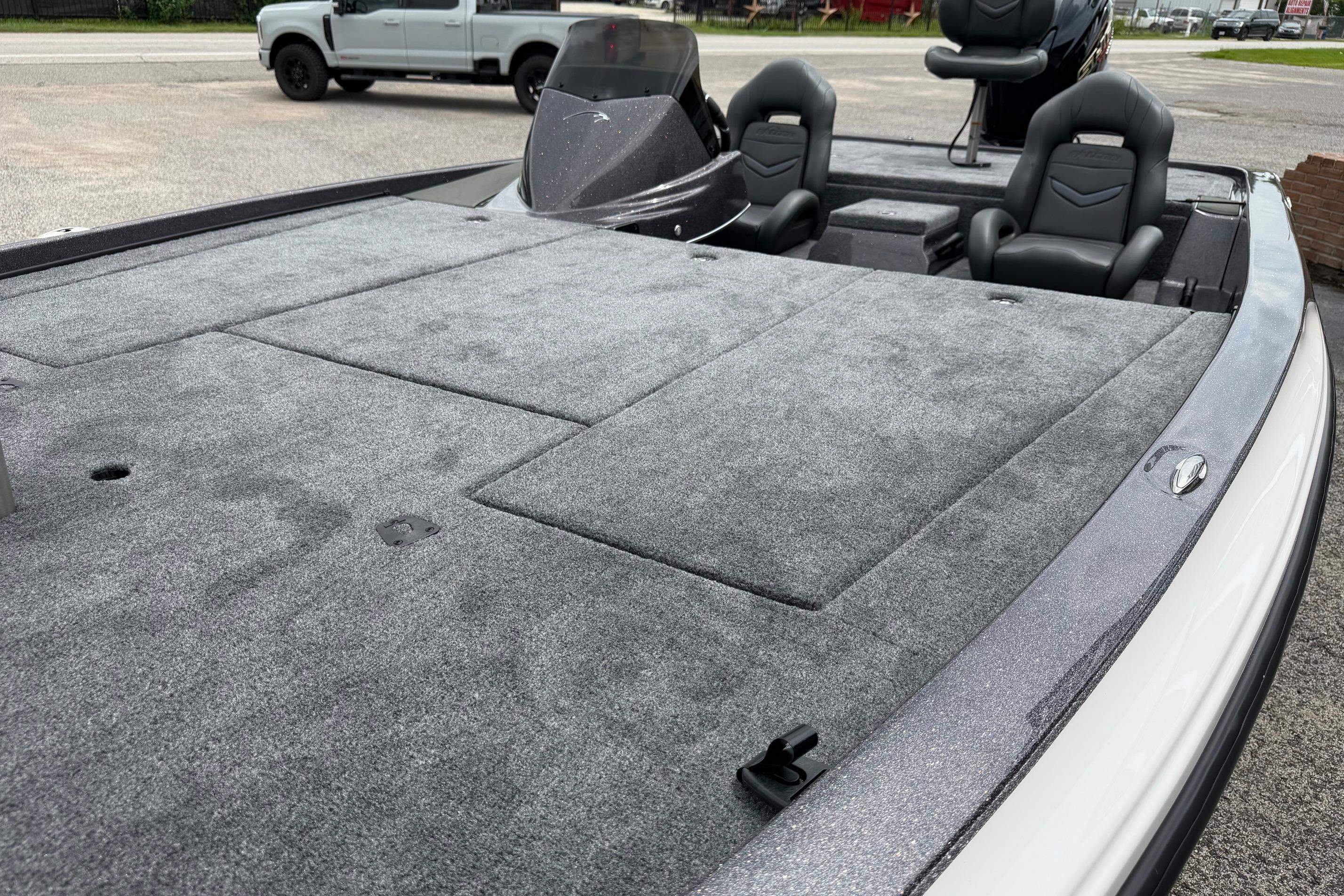 2027 Falcon Boats F215 interior with spacious deck and seating.