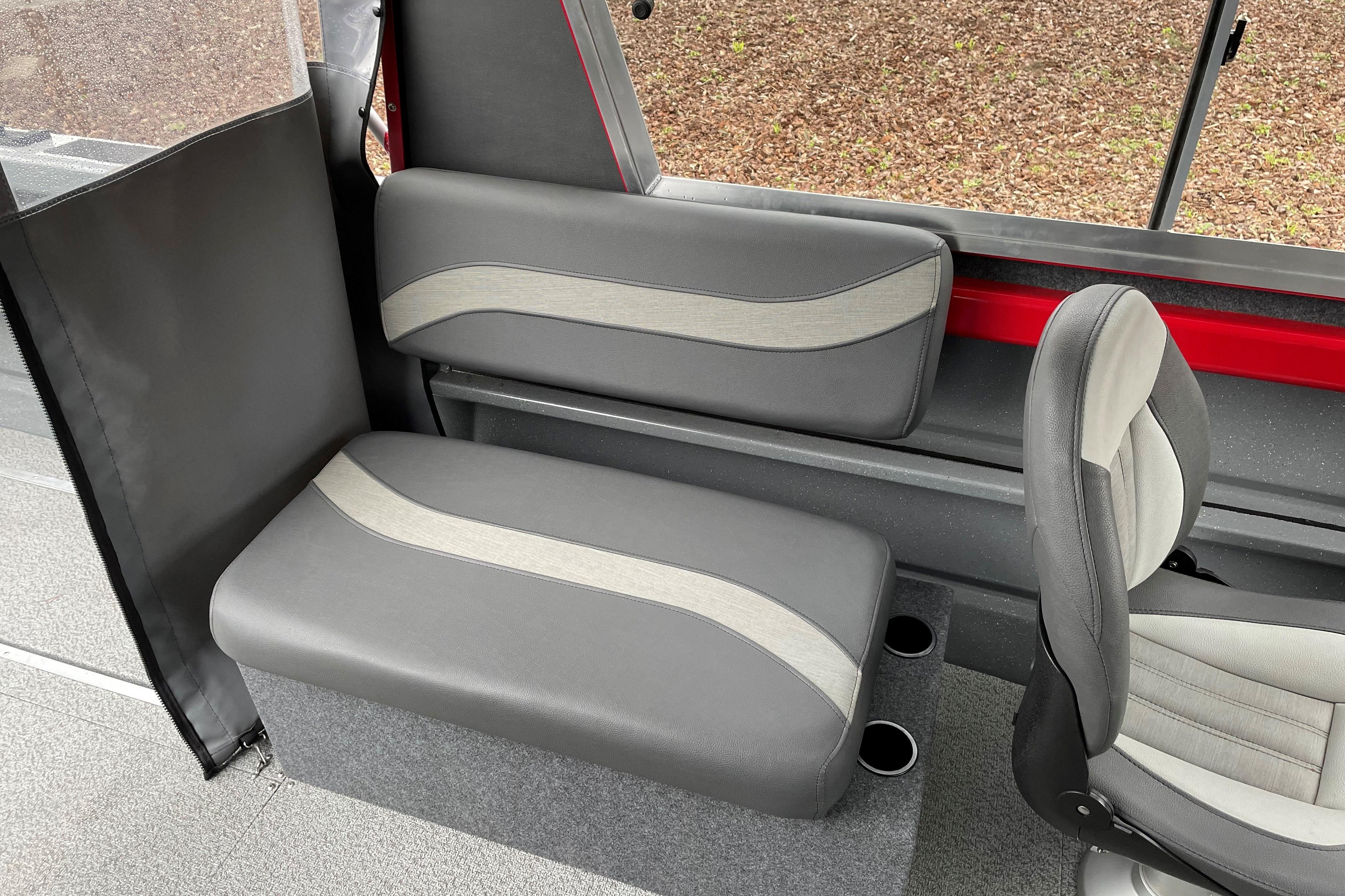 2024 Spartan 200 Astoria interior seating with gray and beige upholstery.