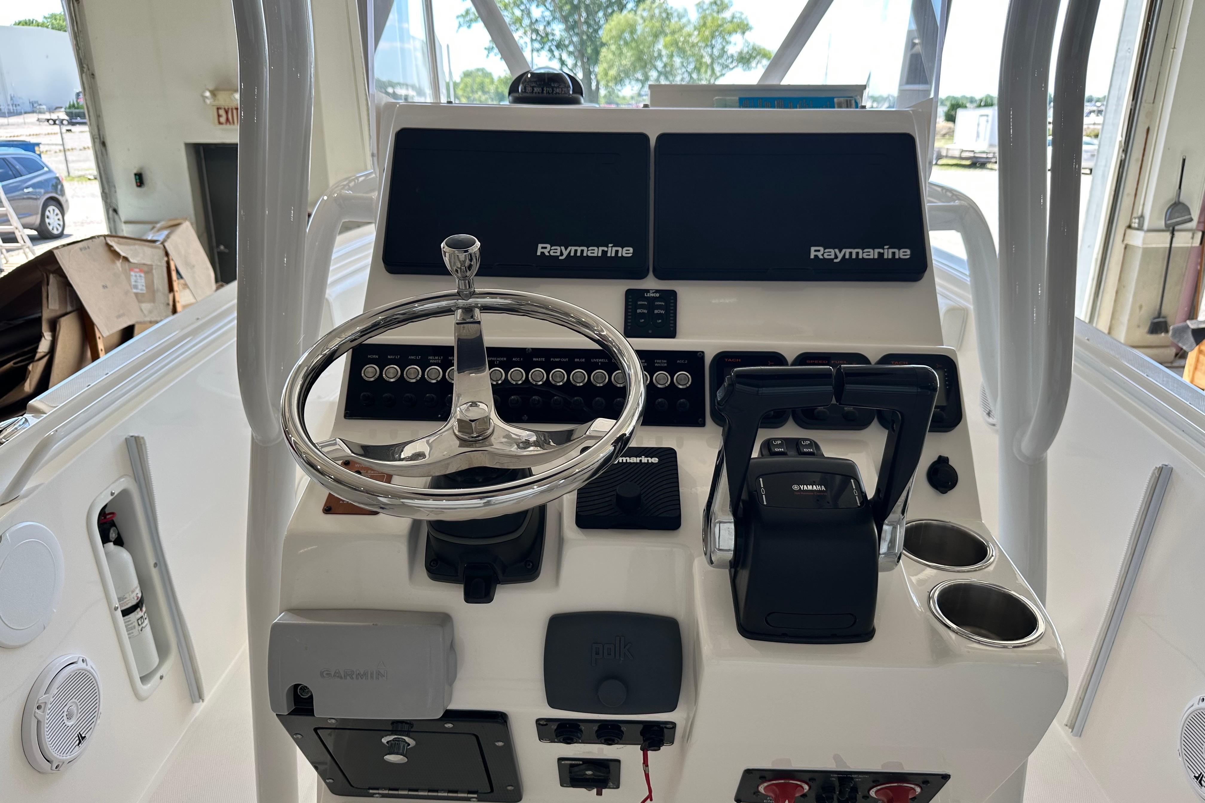 Edgewater 245CC 2015 boat console with Raymarine displays and Yamaha controls.