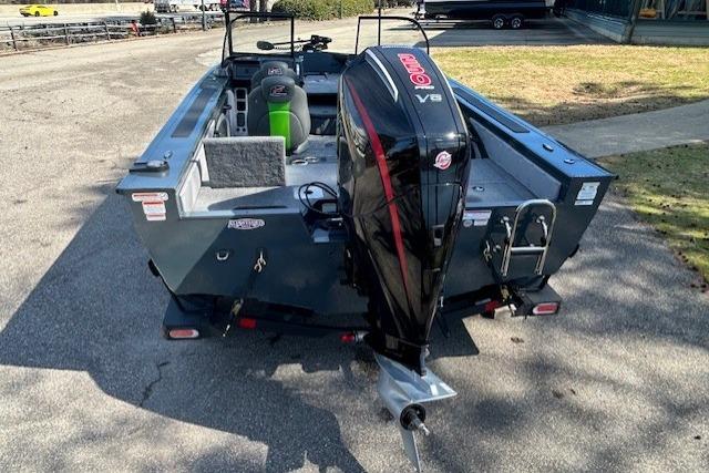 2025 Ranger VX1988 WT boat with powerful outboard motor, parked on pavement.