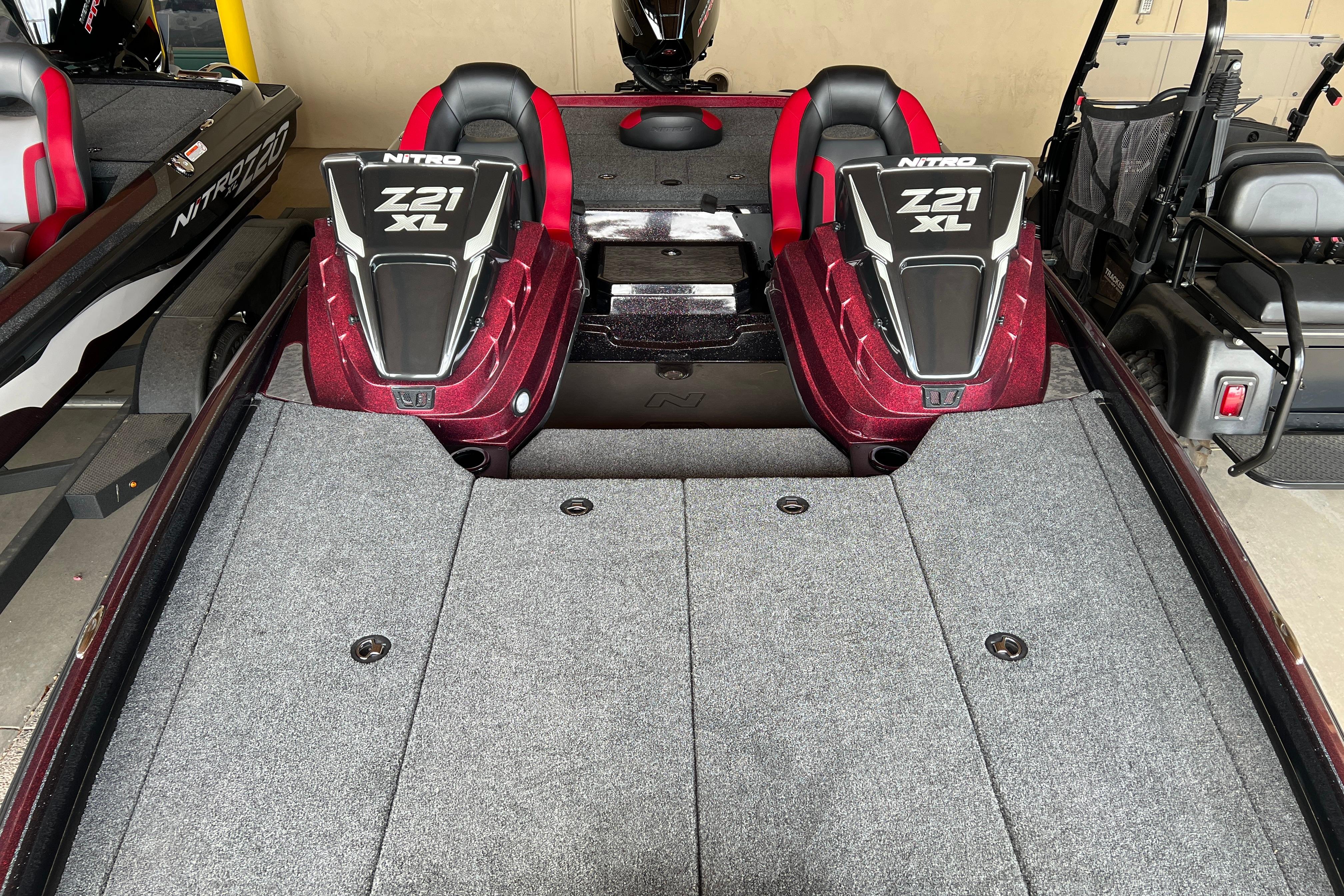 2026 Nitro Z21 XL boat interior with dual seats and carpeted deck.